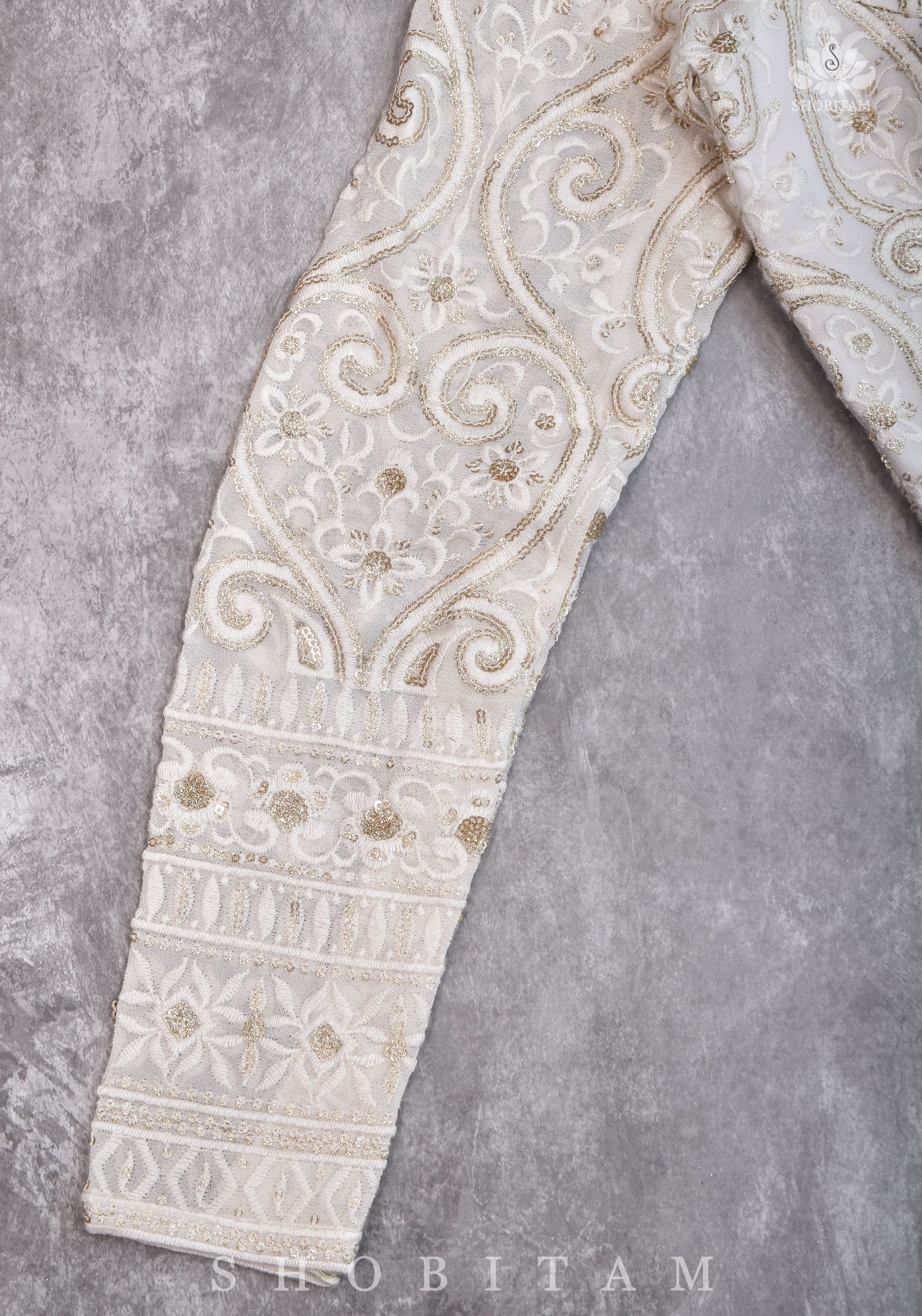Chikankari style Full Jaal machine embroidered full sleeves blouse in Ivory Georgette with Gold tone highlights | Shobitam