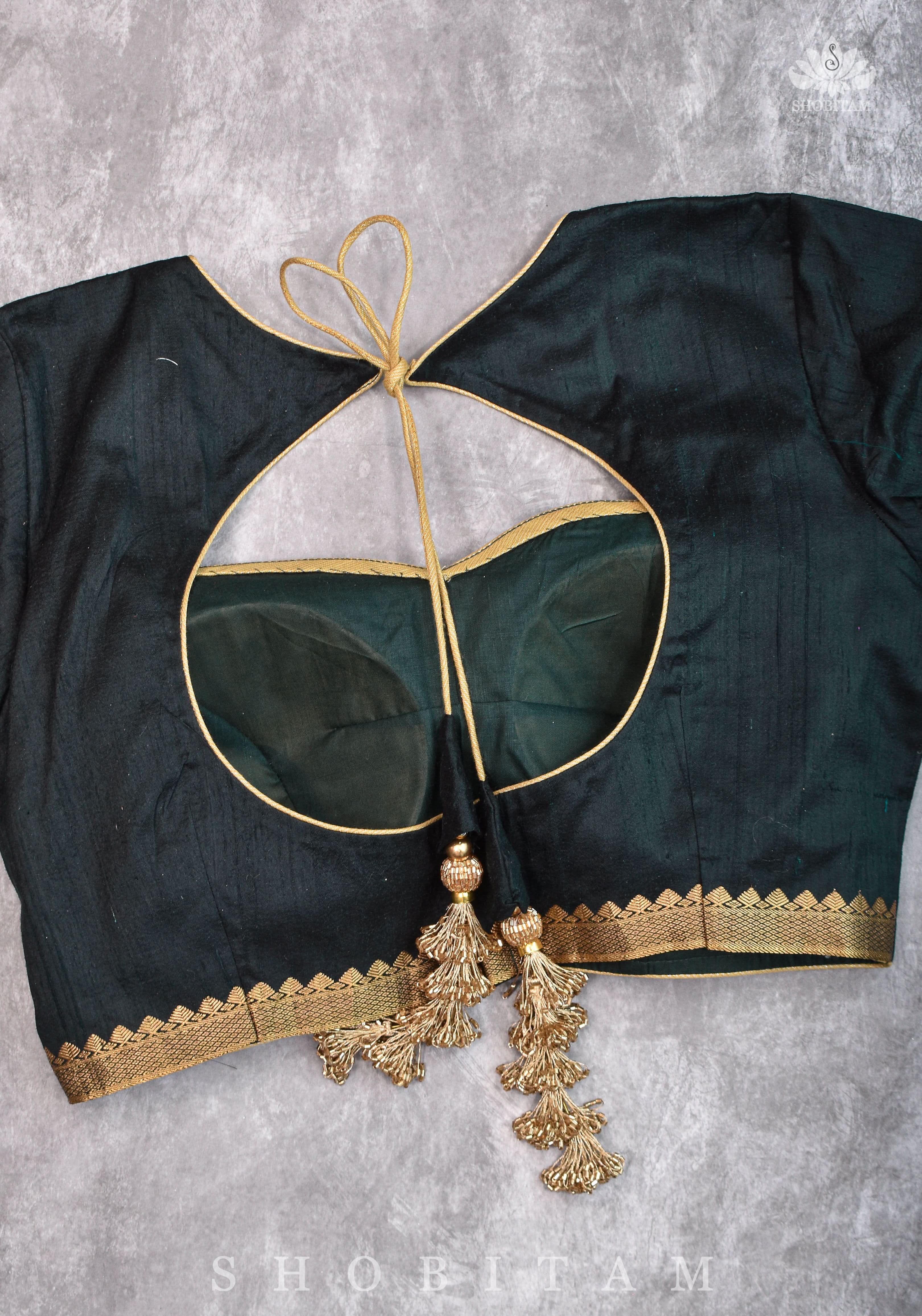 Green Pure Raw Silk Blouse with Leaf Neck, Zari detailing and Cutdana Tassels | Shobitam