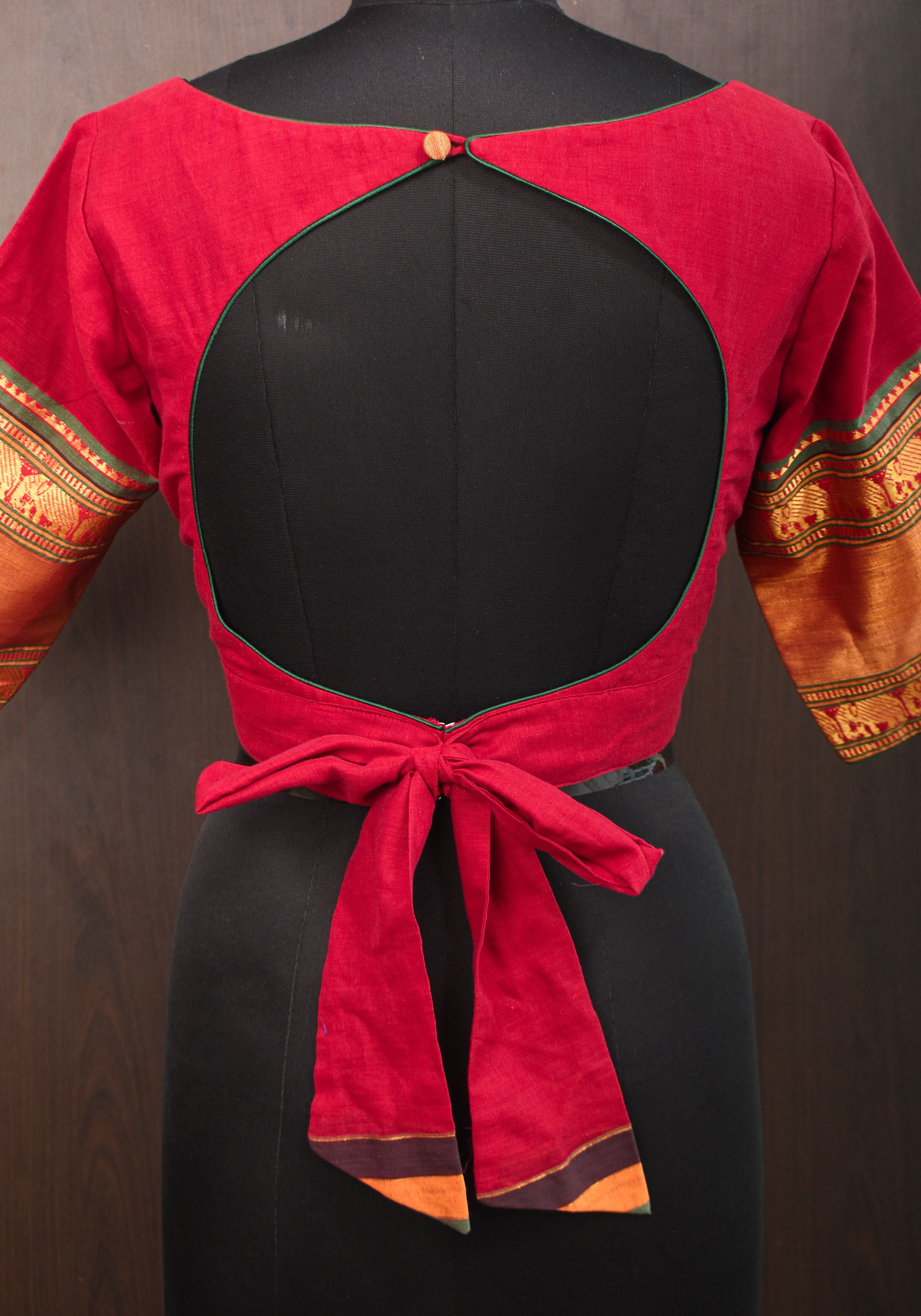 Maroon Narayanpet cotton boatneck blouse with oval cutout and tieback design | Shobitam