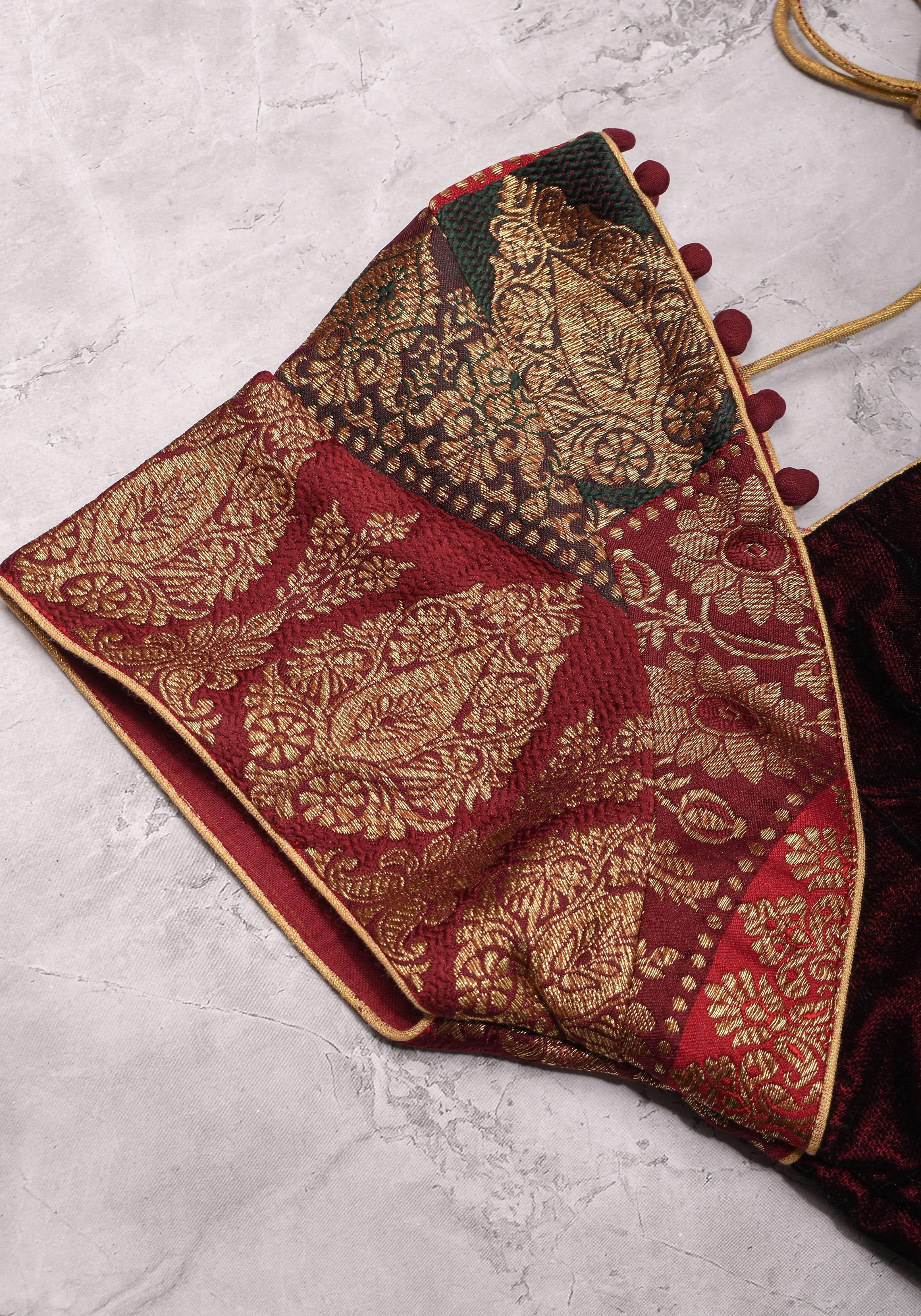 Burgundy Velvet and Banarasi brocade Sweetheart neck blouse, with potli button detailing on neckline, Made to Order | Shobitam