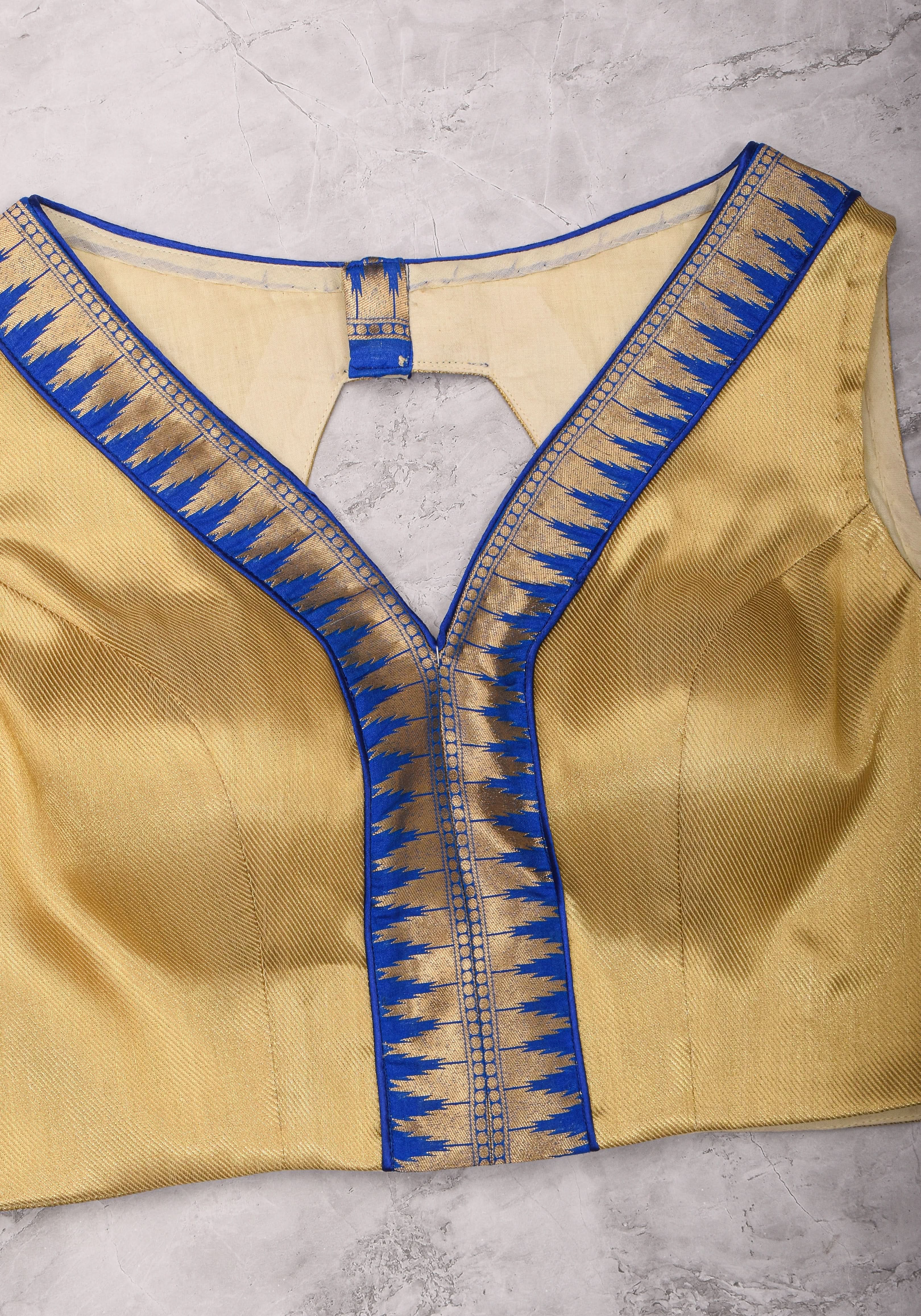 Muted Gold V neck neck sleeveless blouse with blue temple border, Made to Order | Shobitam