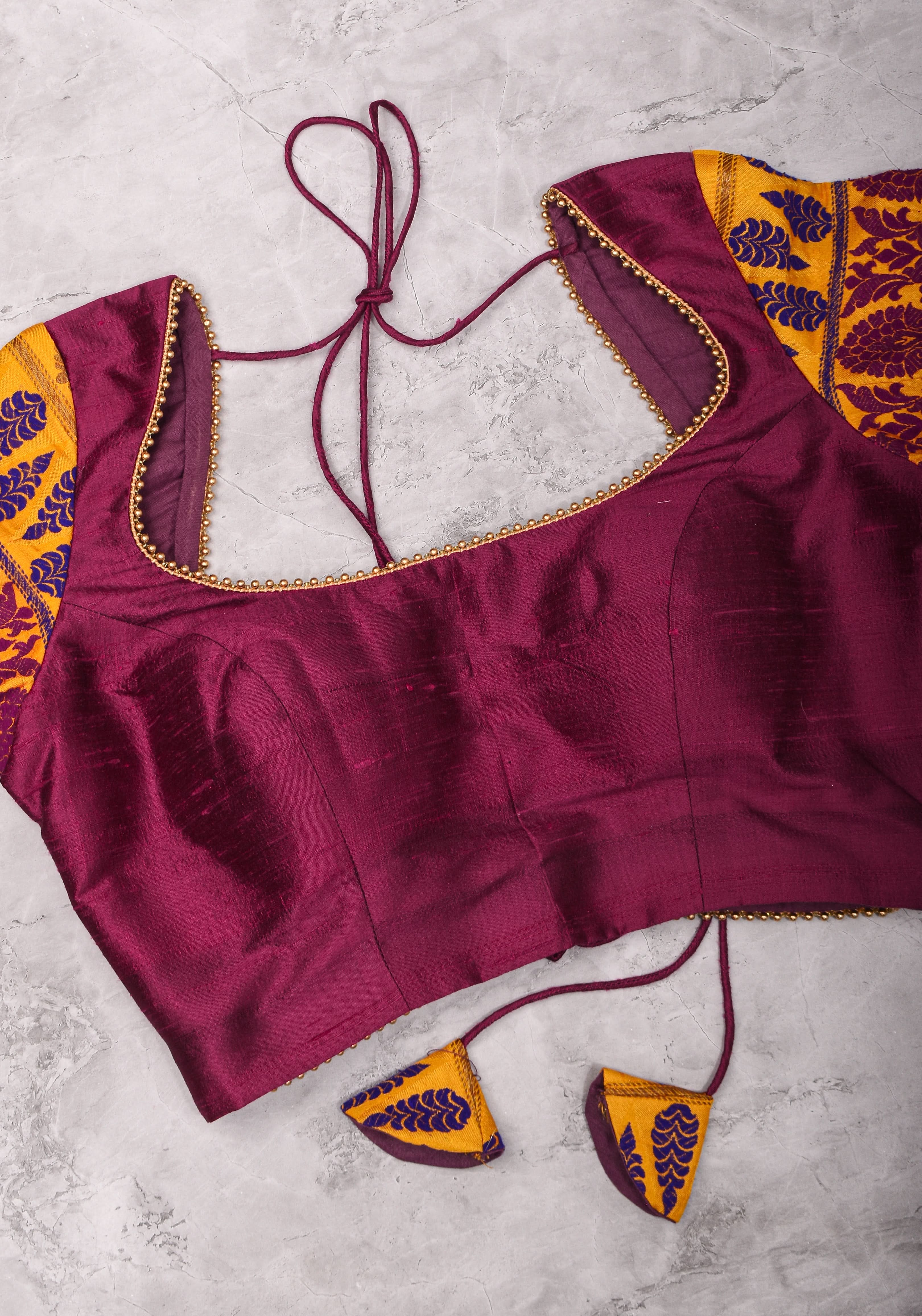 Magenta Pure rawsilk with yellow brocade U neck Blouse with back tie design, Made to Order | Shobitam
