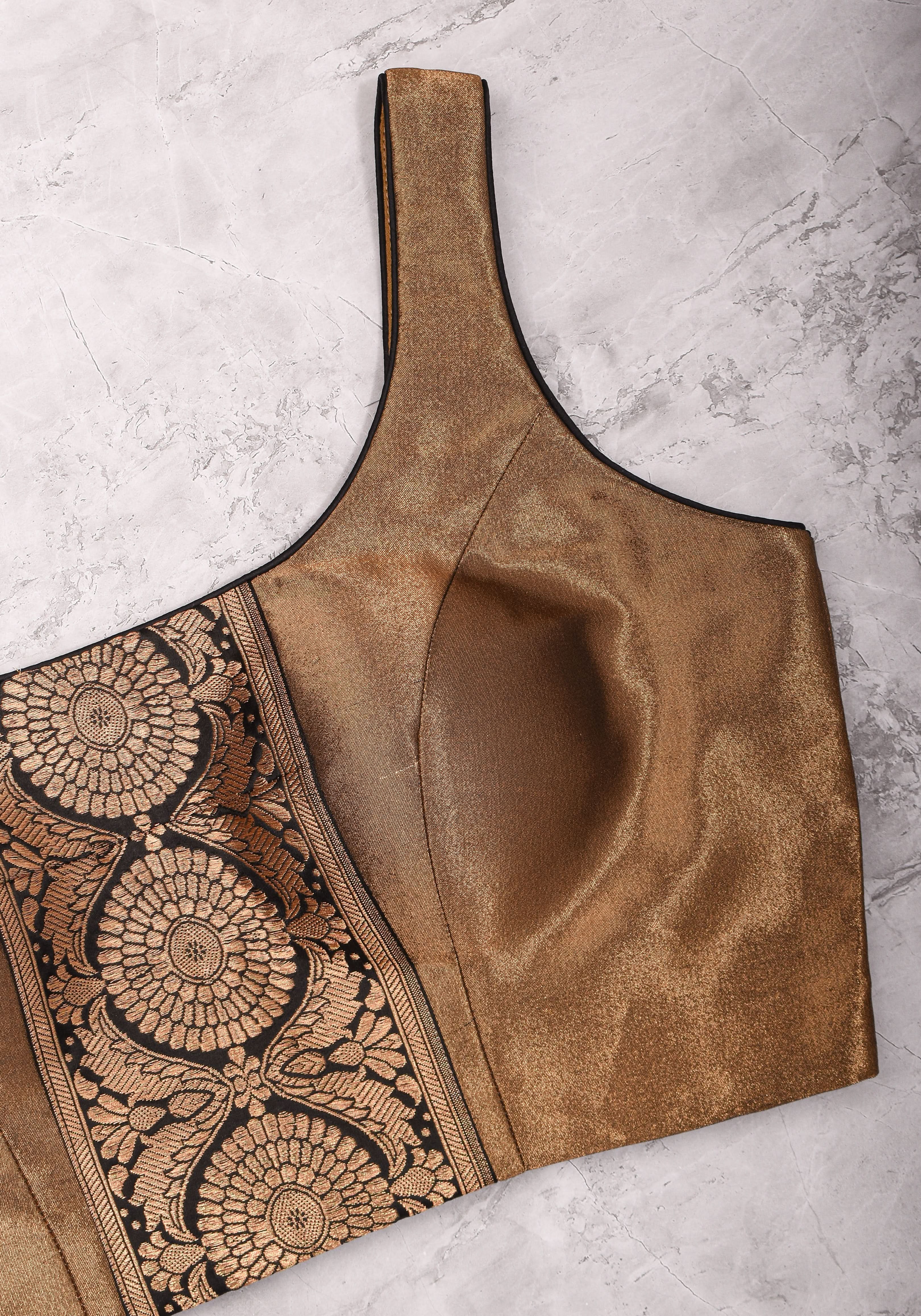 Bronze tissue brocade U neck sleeveless blouse with black brocade detailing | Shobitam