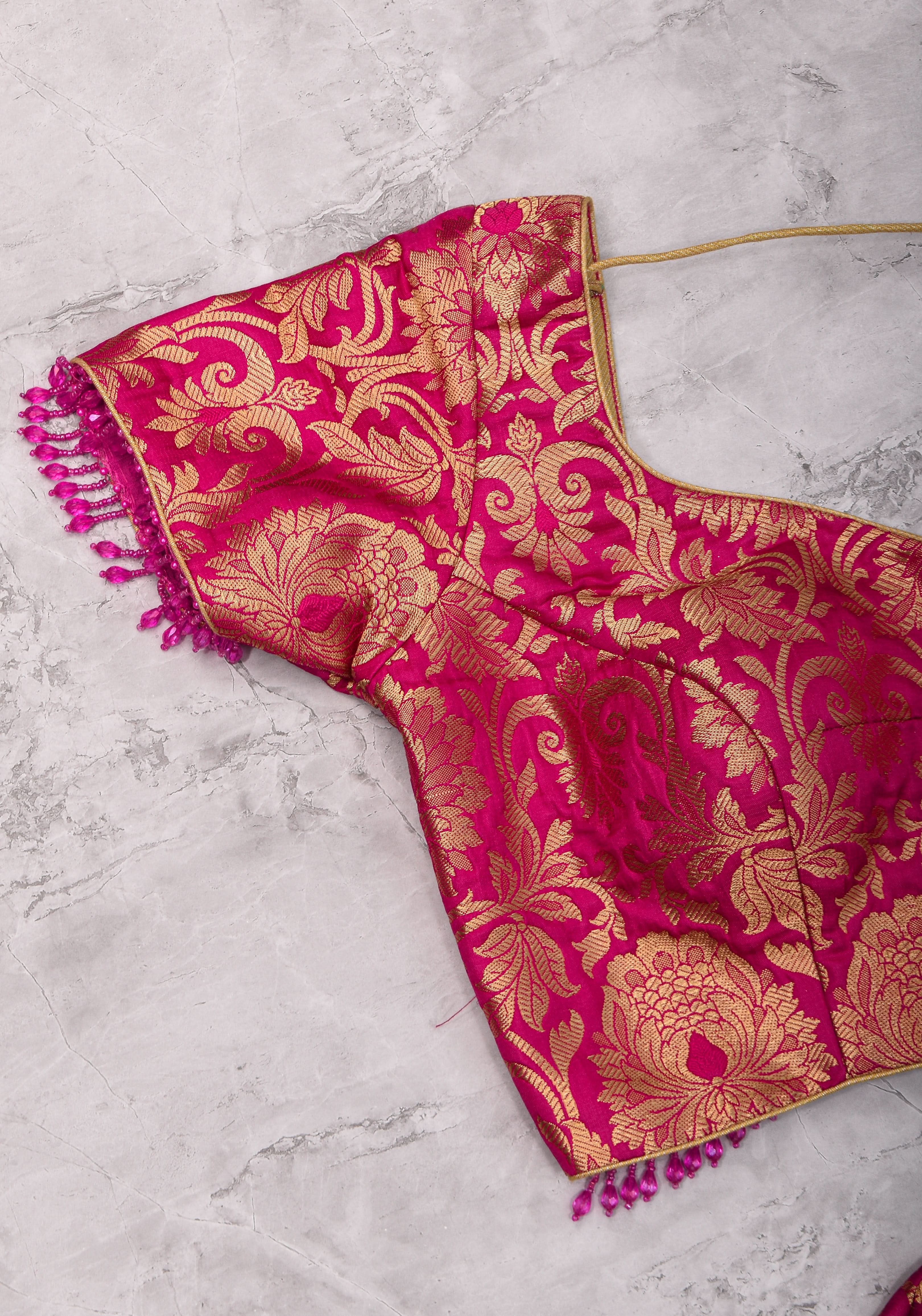 Rani Pink Banarasi Brocade Blouse with Back tie design and dangling beads | Shobitam