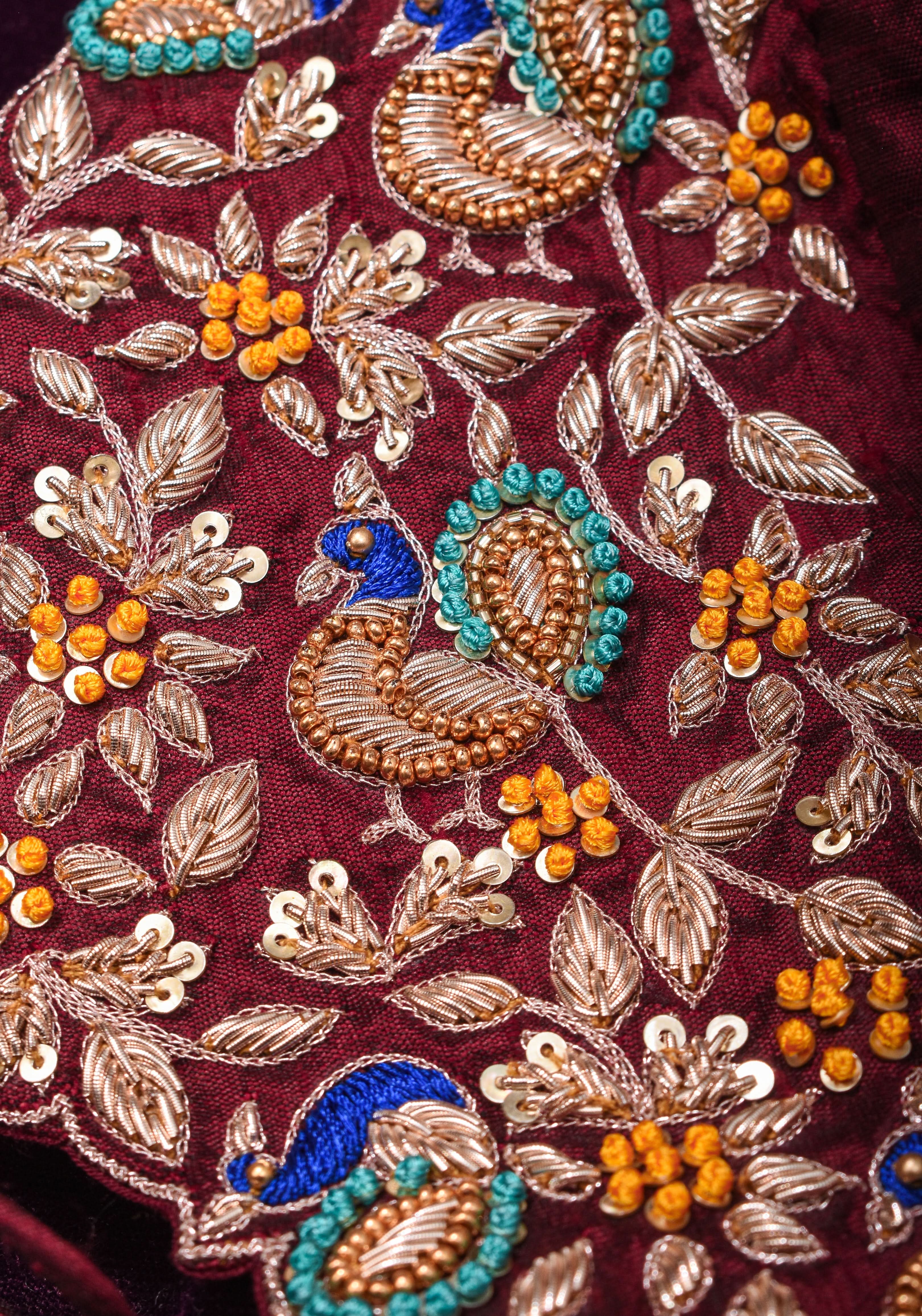 Made To Order: Maroon Pure Raw Silk Heavy Hand work Meenakari and Zardosi Peacock Design Blouse | Shobitam