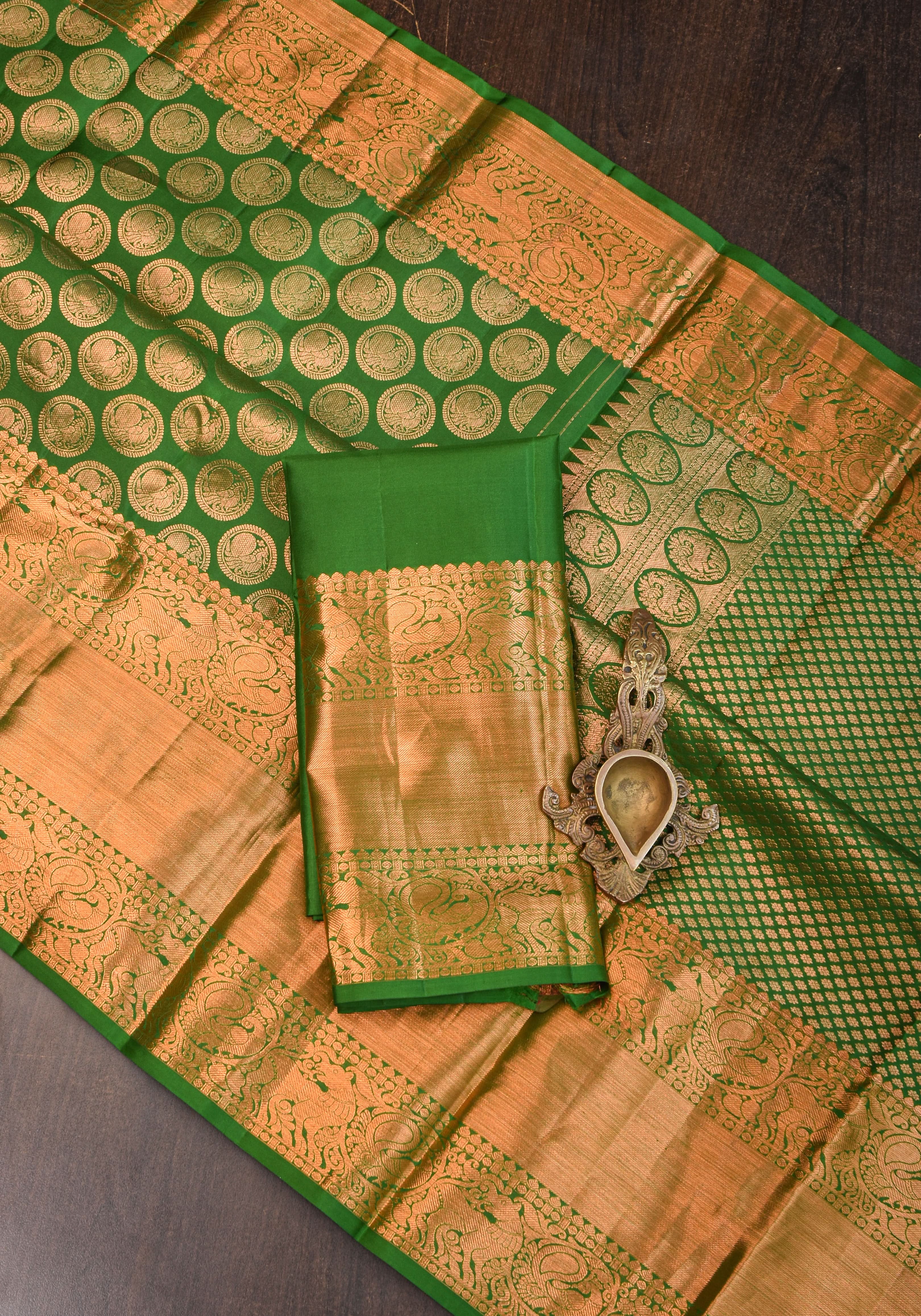 Exquisite Celebrity Grand Brocade Kanjivaram Pure Silk Saree in Leaf Green with Intricate Pallu and Zari | SILK MARK CERTIFIED | Shobitam