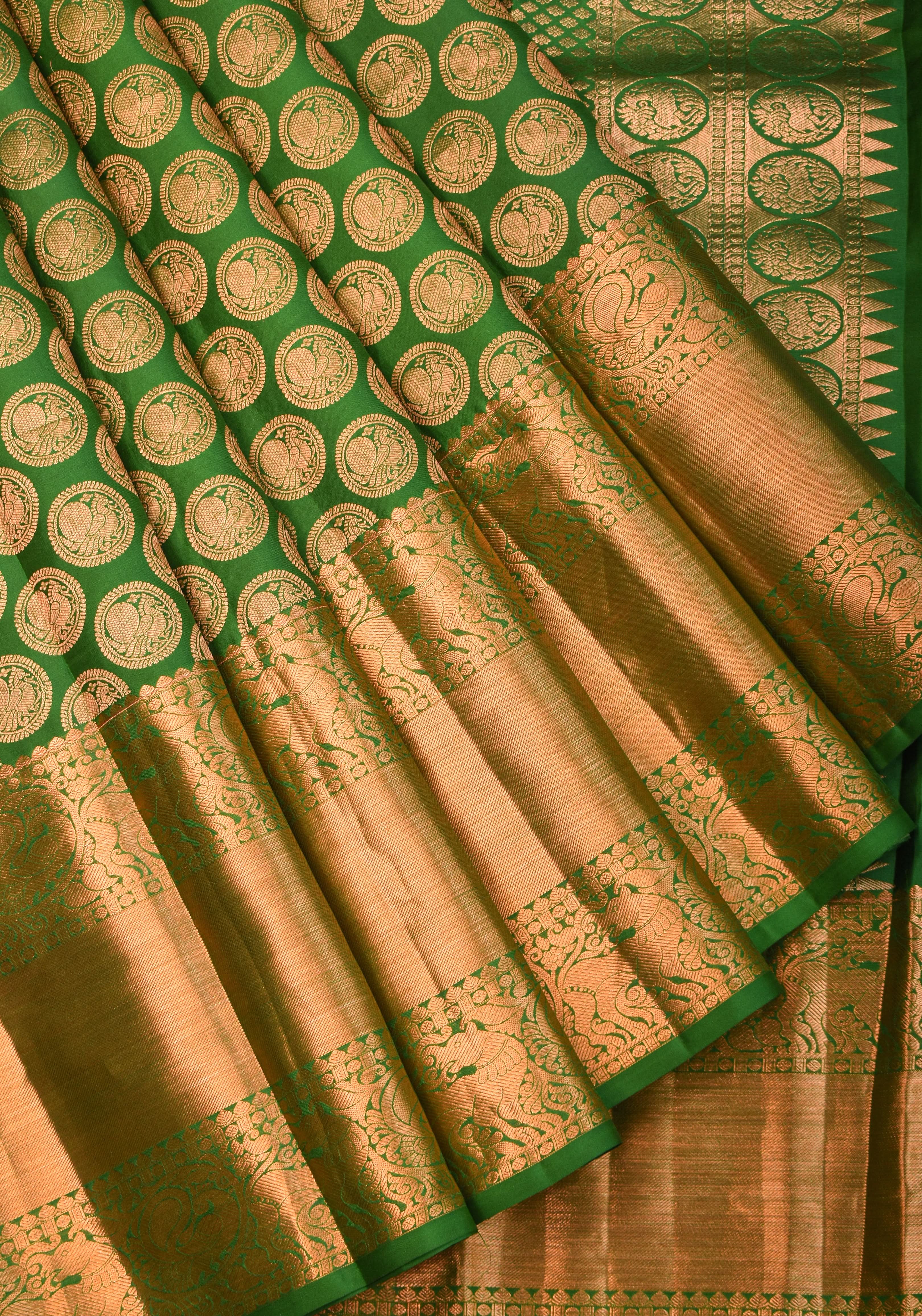 Exquisite Celebrity Grand Brocade Kanjivaram Pure Silk Saree in Leaf Green with Intricate Pallu and Zari | SILK MARK CERTIFIED | Shobitam