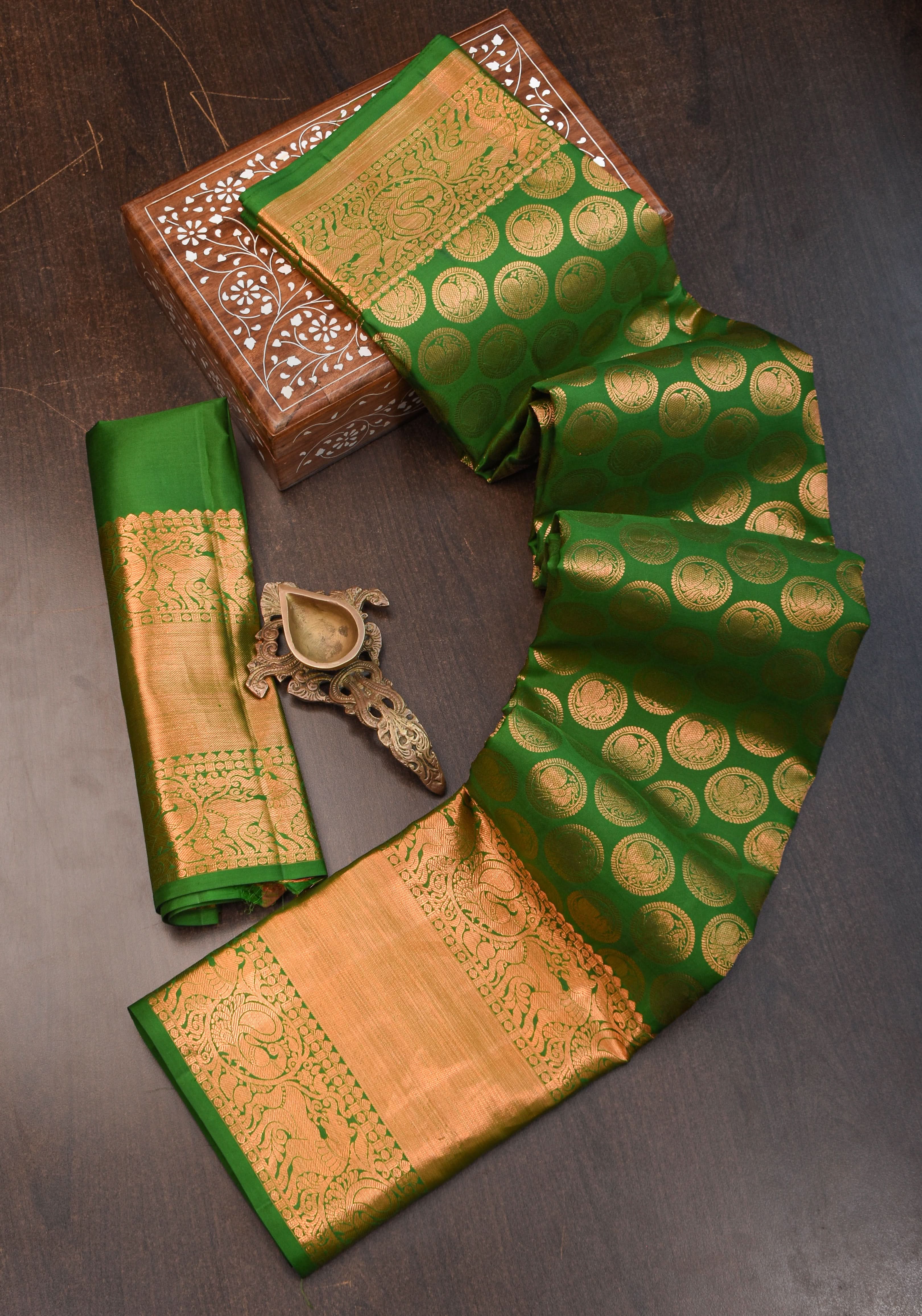 Exquisite Celebrity Grand Brocade Kanjivaram Pure Silk Saree in Leaf Green with Intricate Pallu and Zari | SILK MARK CERTIFIED | Shobitam