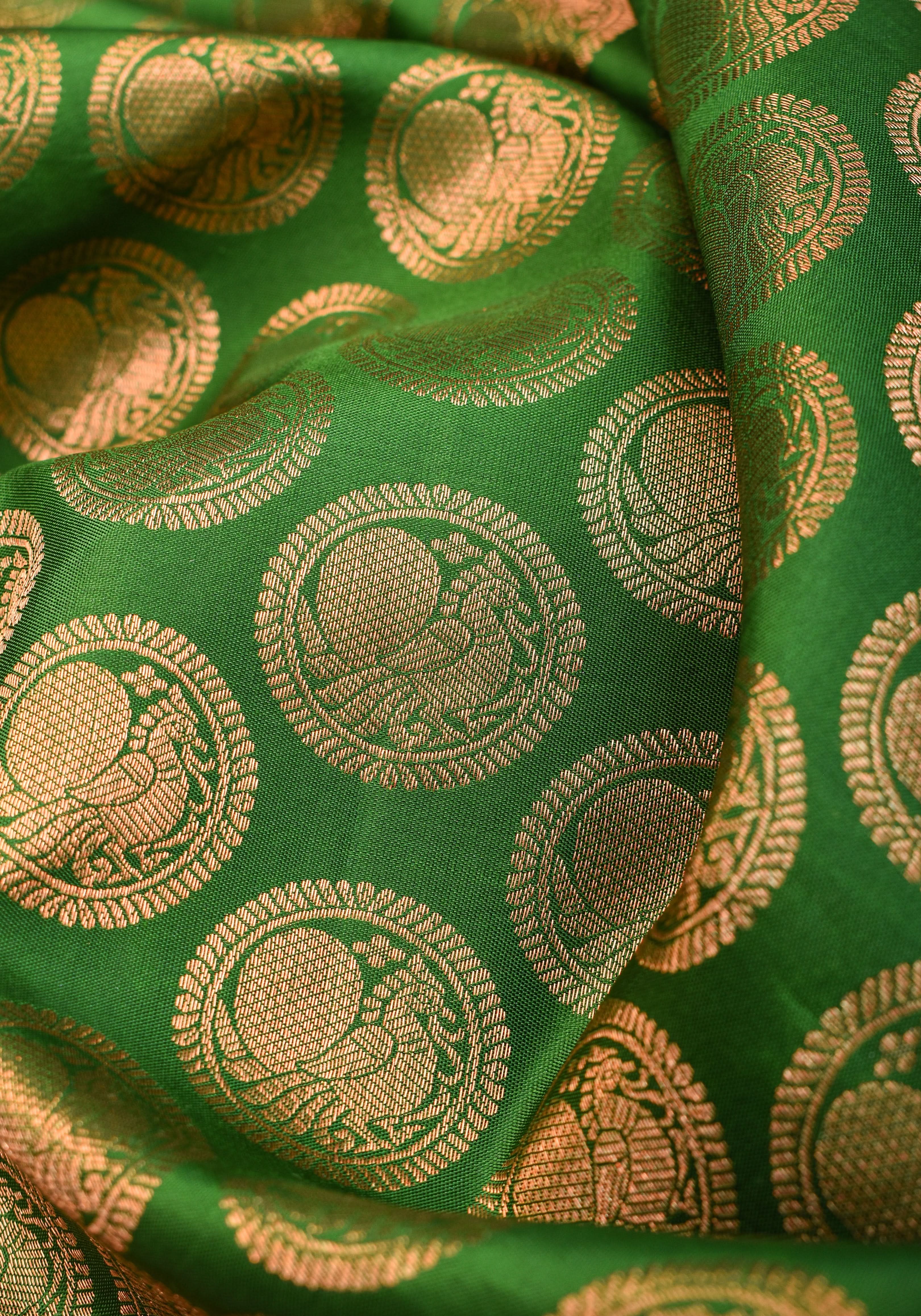 Exquisite Celebrity Grand Brocade Kanjivaram Pure Silk Saree in Leaf Green with Intricate Pallu and Zari | SILK MARK CERTIFIED | Shobitam
