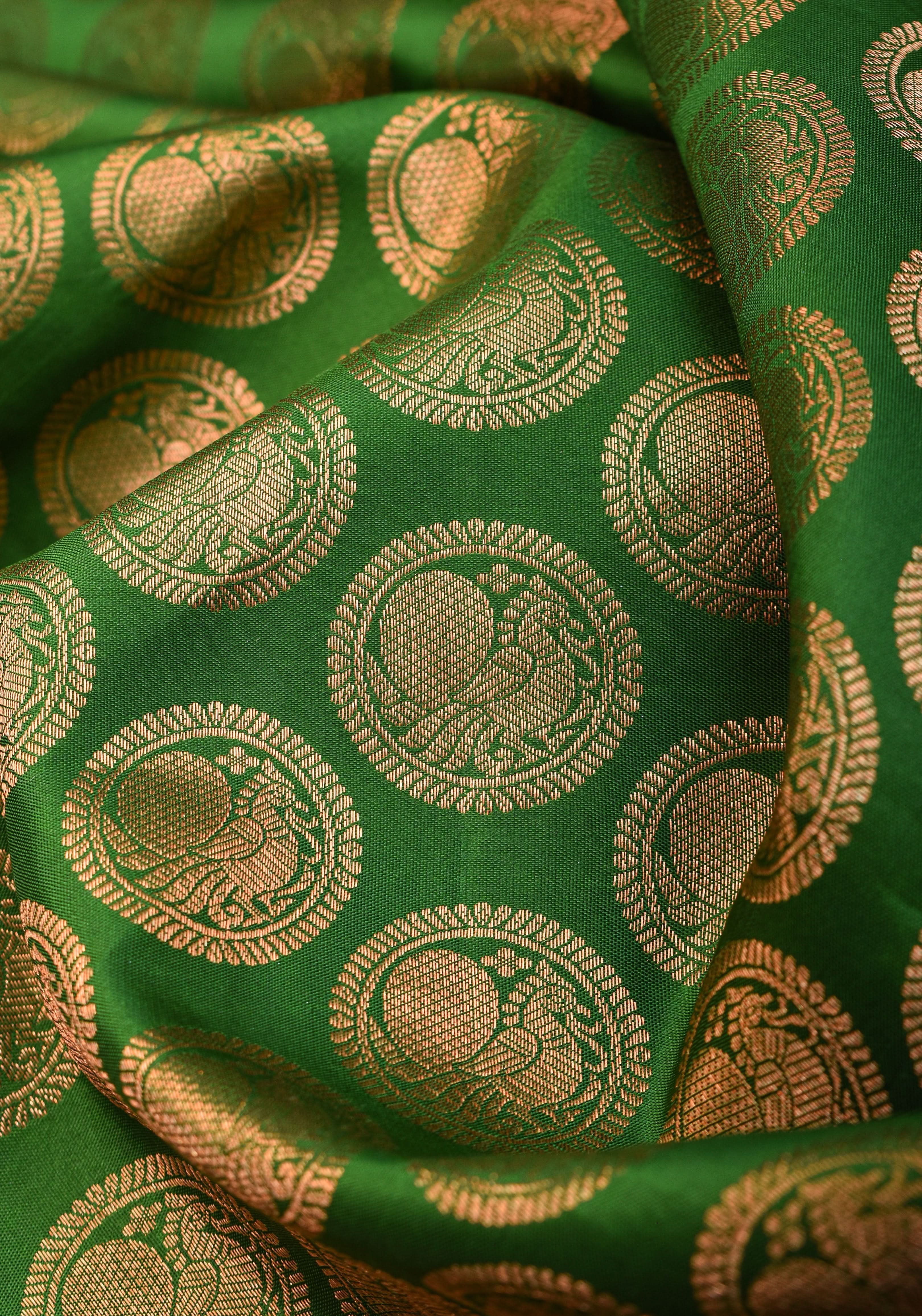 Exquisite Celebrity Grand Brocade Kanjivaram Pure Silk Saree in Leaf Green with Intricate Pallu and Zari | SILK MARK CERTIFIED | Shobitam