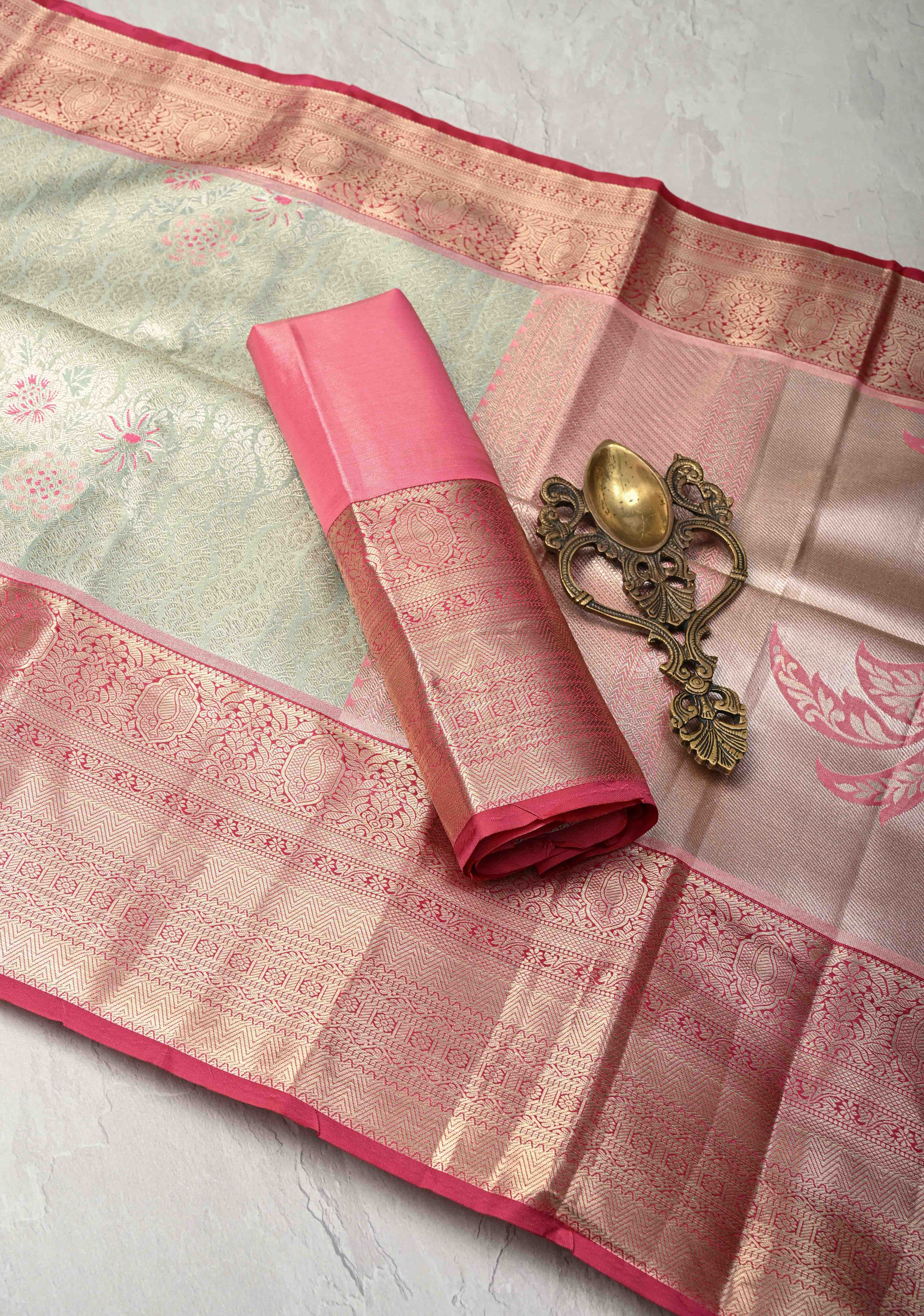 Sage Green Floral Brocade on Kanjivaram Tissue Semi Silk Saree with Meenakari Buttas and Contrast Zari Border | Shobitam