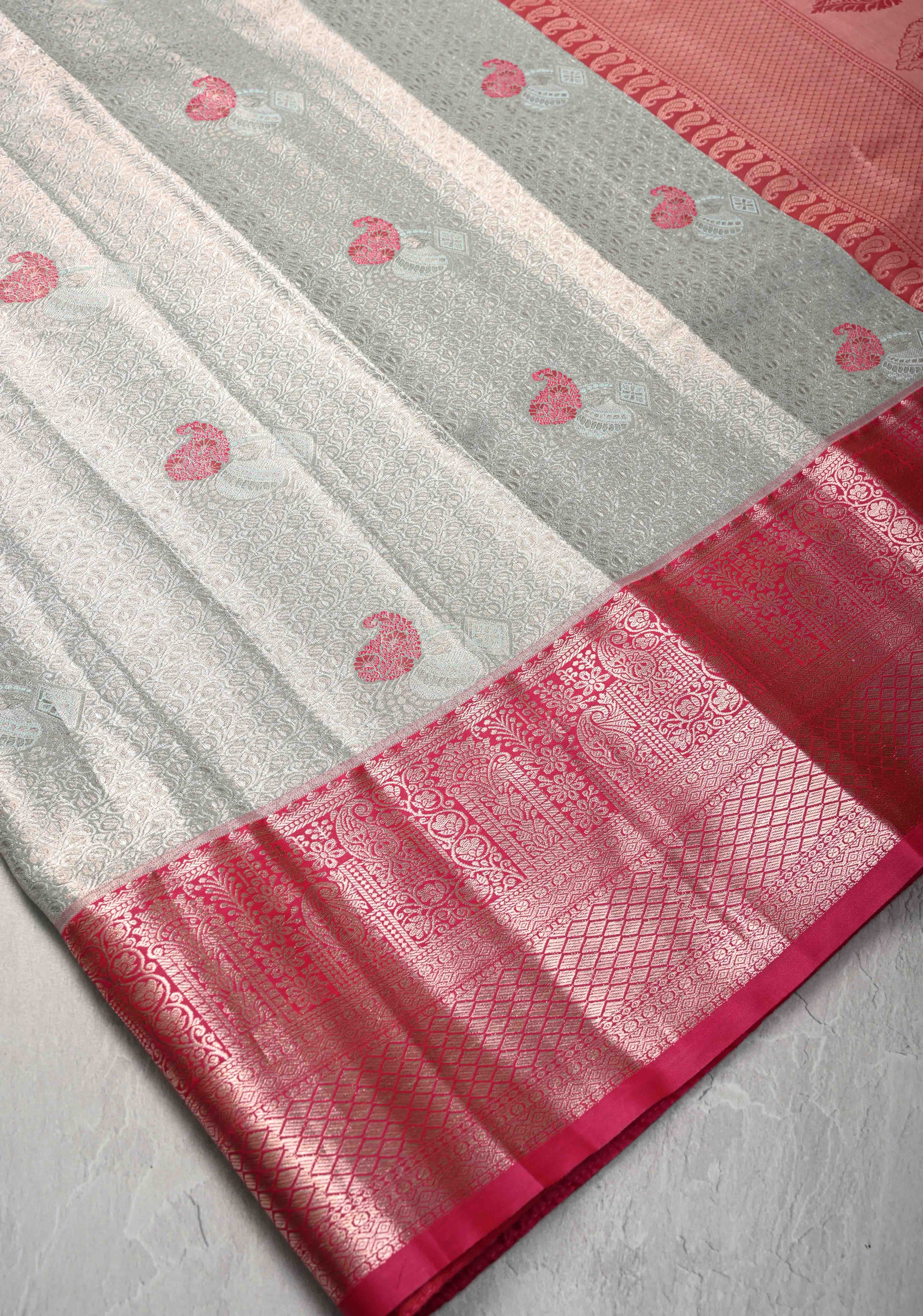 Light Sage Green Brocade on Kanjivaram Tissue Semi Silk Saree with Meenakari Buttas and Contrast Zari Border | Shobitam