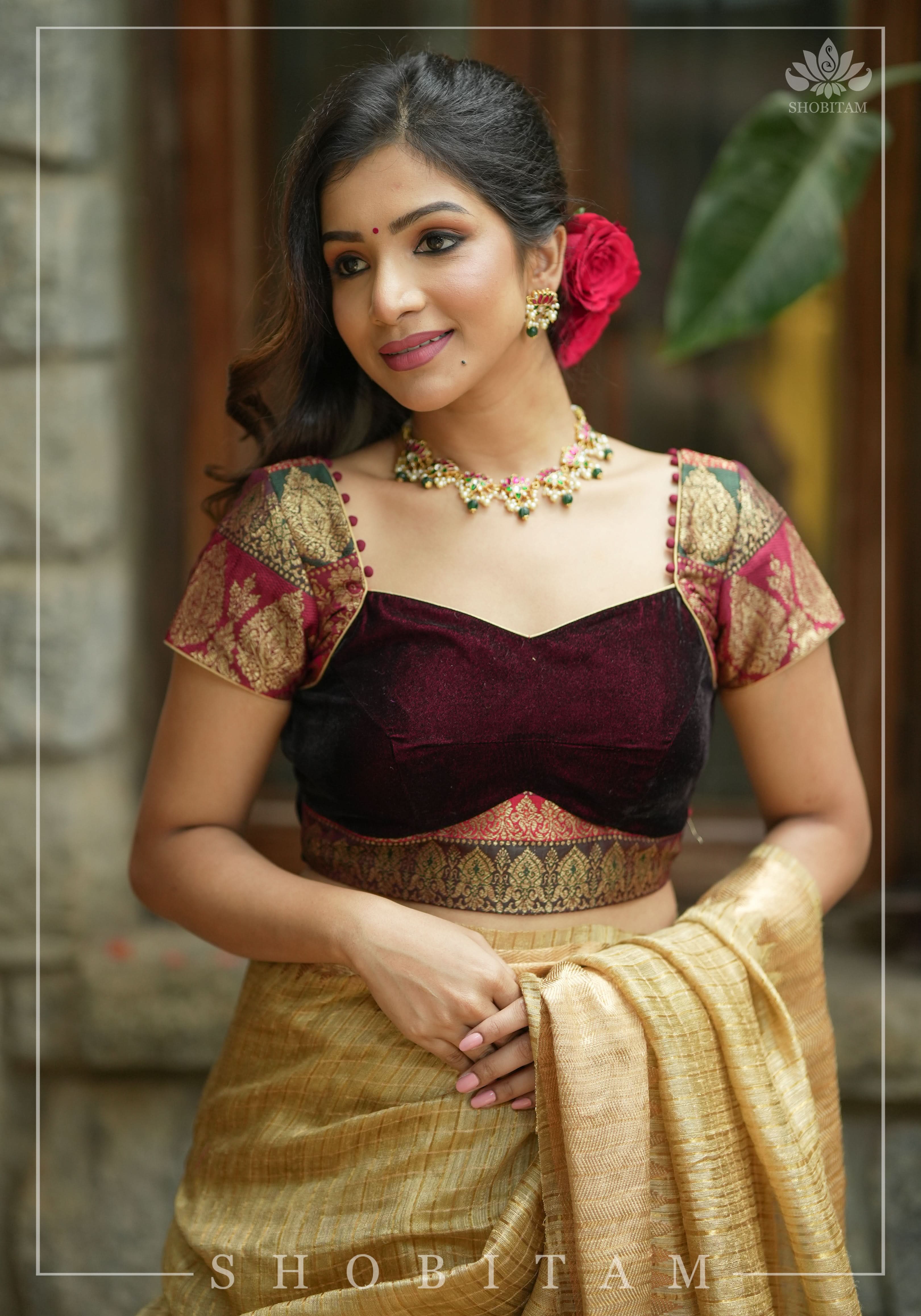 Burgundy Velvet and Banarasi brocade Sweetheart neck blouse, with potli button detailing on neckline, Made to Order | Shobitam