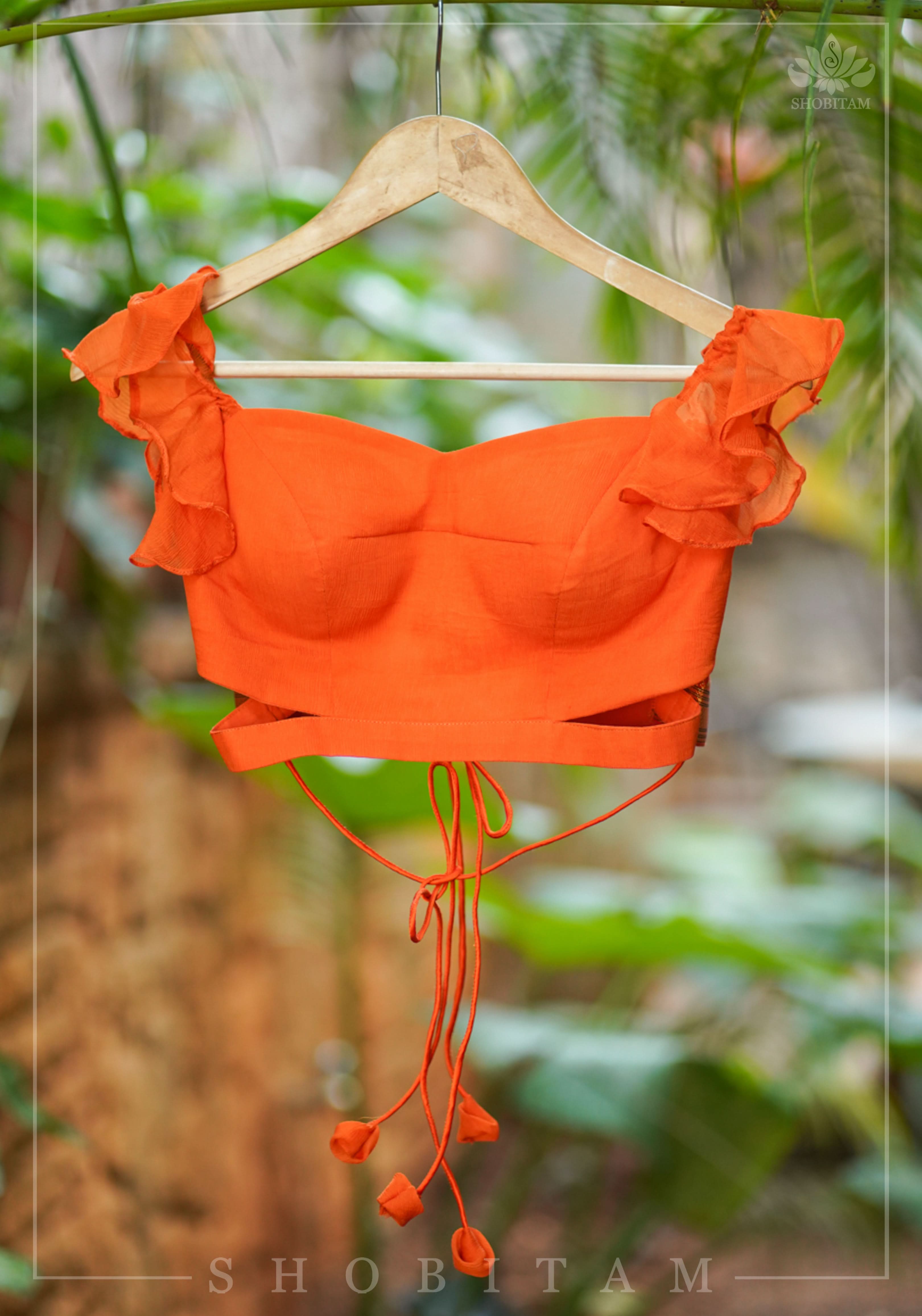 Orange chiffon sweetheart neck blouse with ruffle sleeves | Shobitam