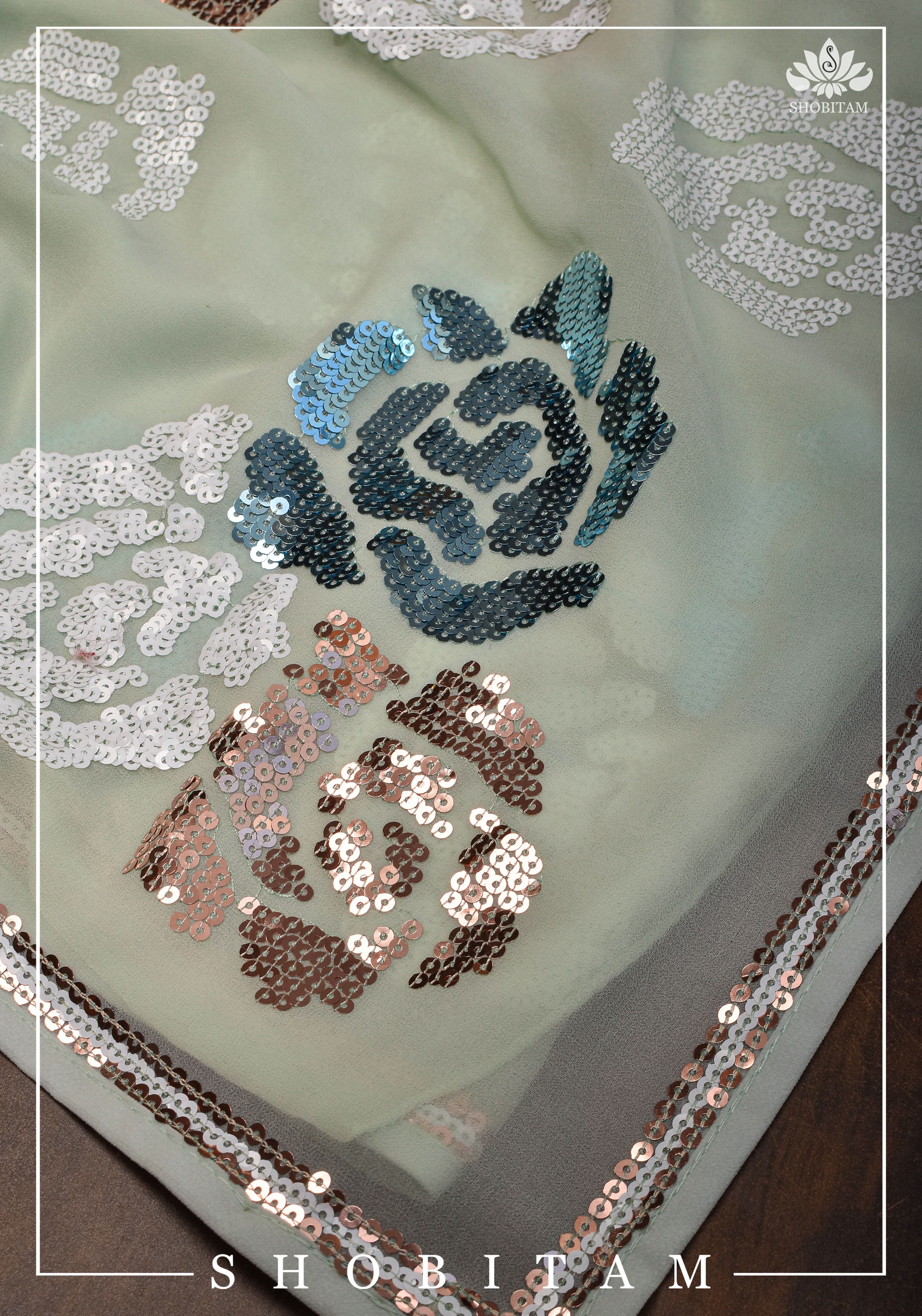 Georgette Saree in pale pista green with rose design sequin work | Shobitam