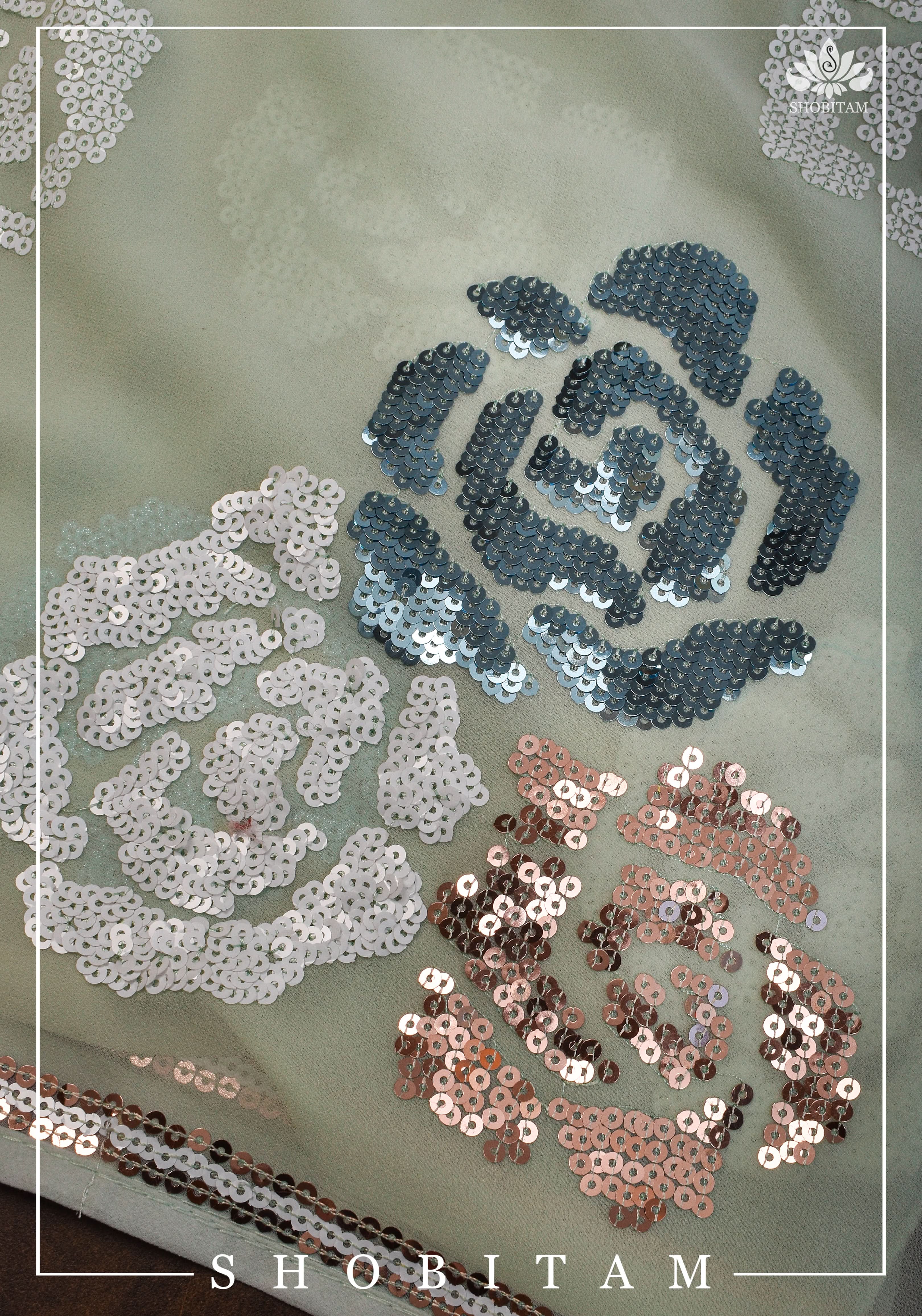 Georgette Saree in pale pista green with rose design sequin work | Shobitam