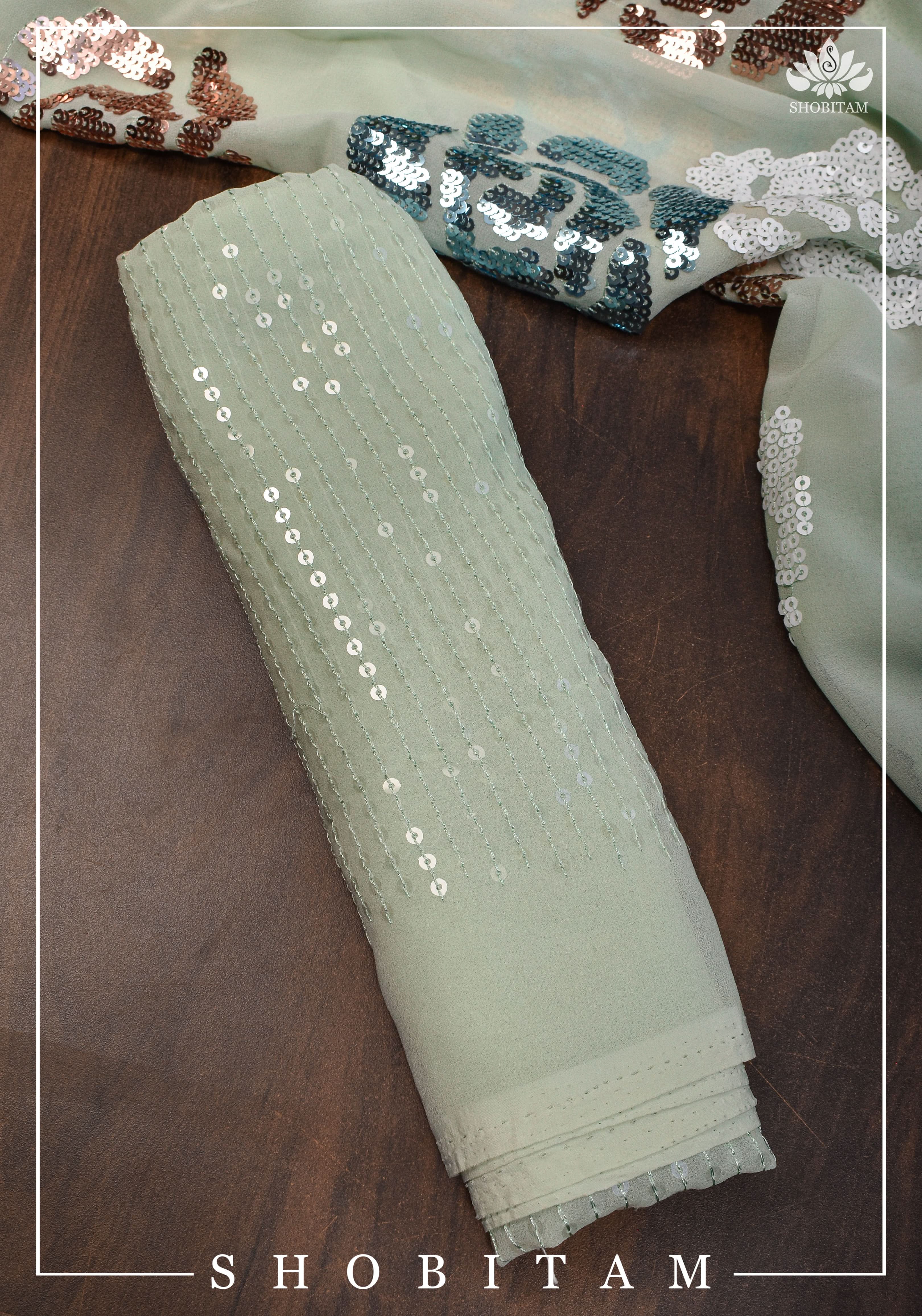 Georgette Saree in pale pista green with rose design sequin work | Shobitam