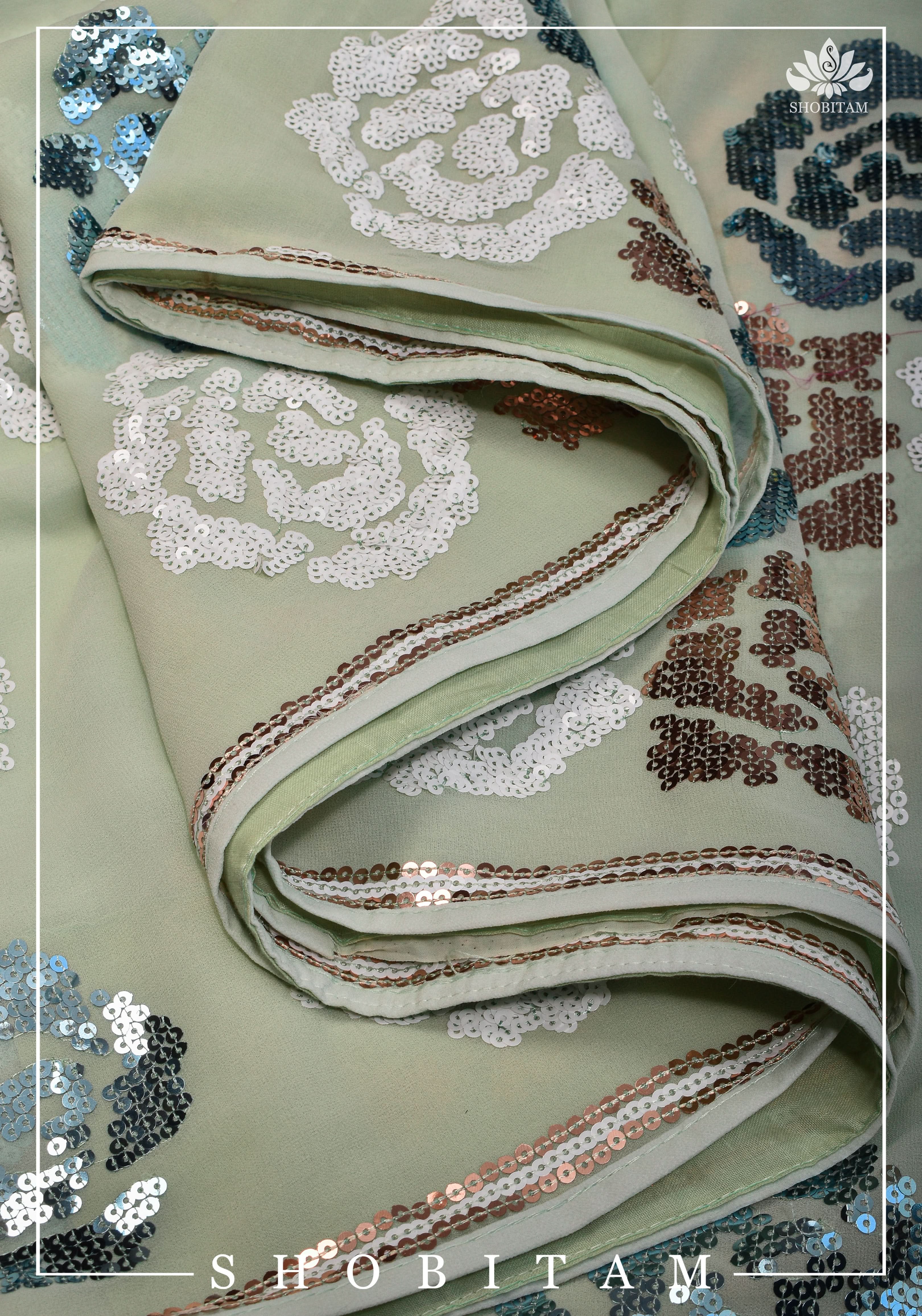 Georgette Saree in pale pista green with rose design sequin work | Shobitam