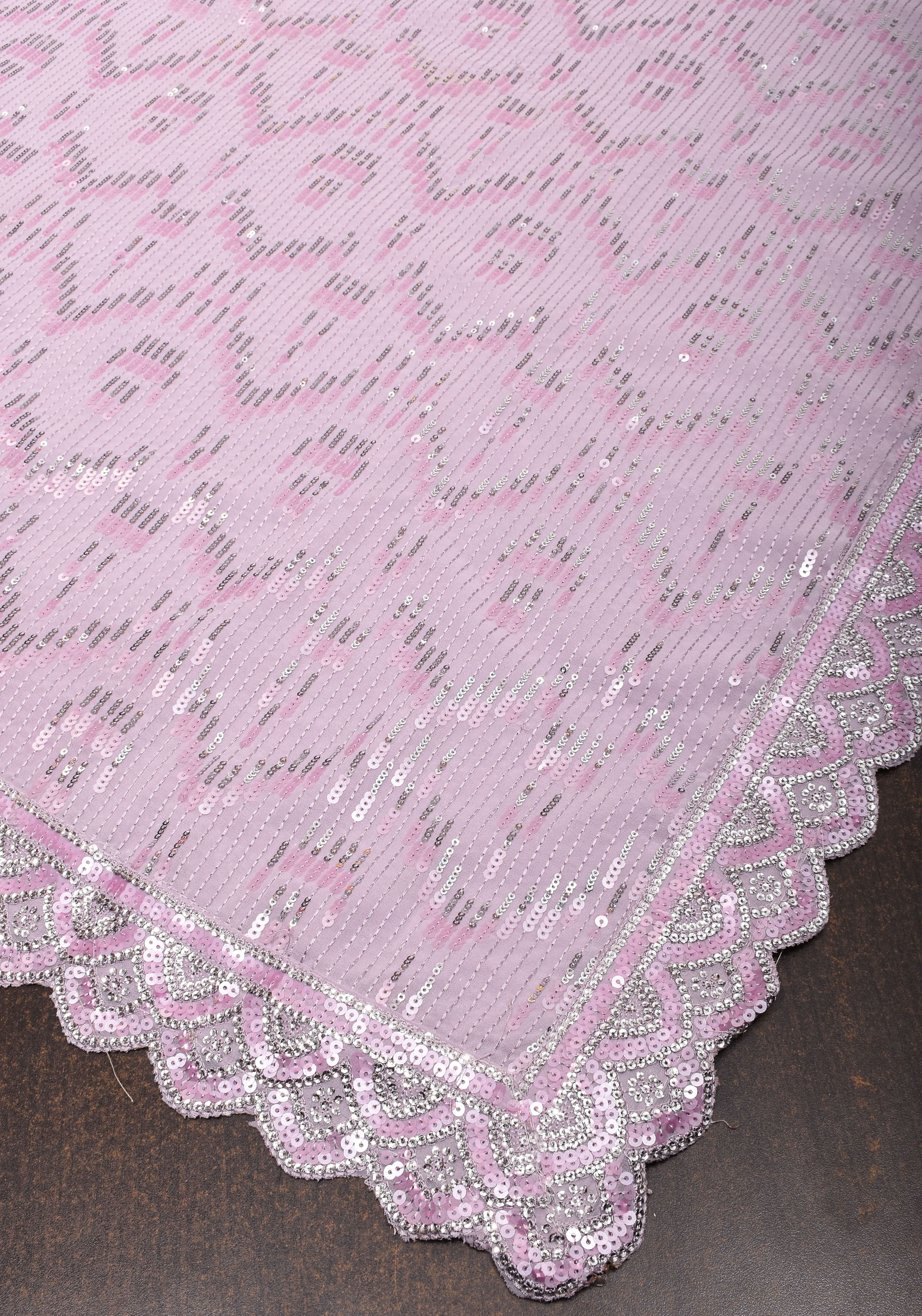 Full Sequins Embellished Georgette Saree in mauve with Scalloped border | Shobitam