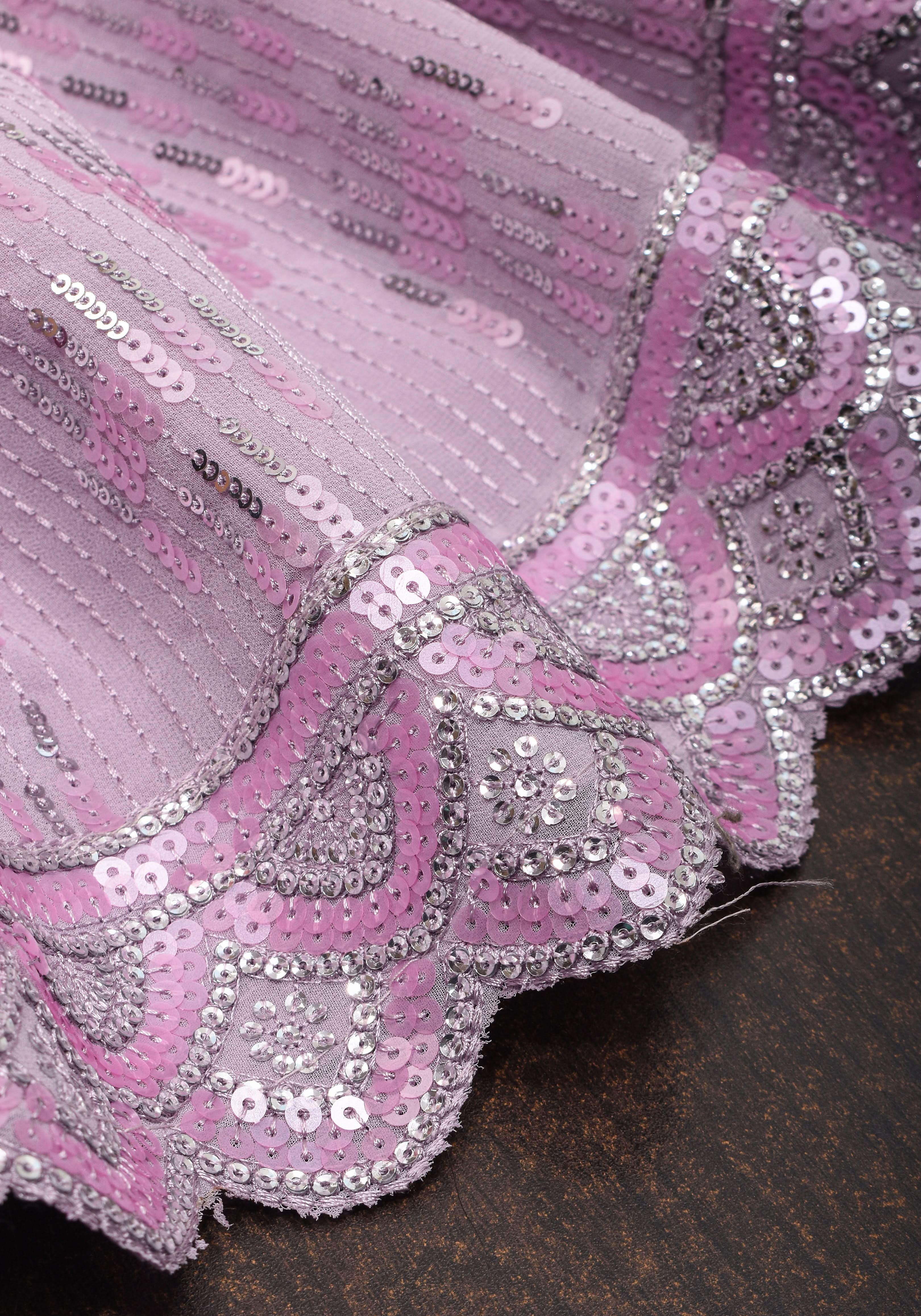 Full Sequins Embellished Georgette Saree in mauve with Scalloped border | Shobitam