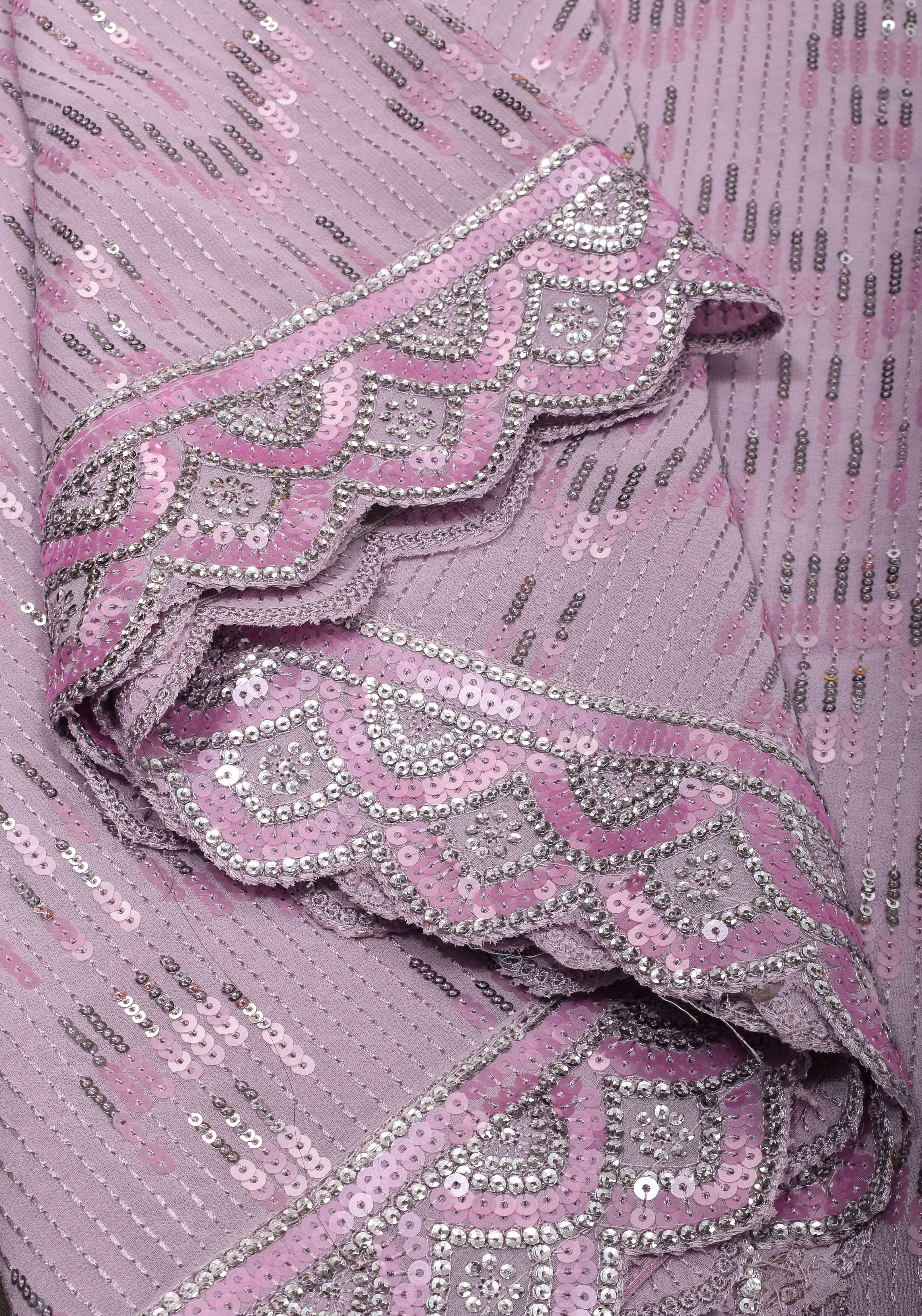 Full Sequins Embellished Georgette Saree in mauve with Scalloped border | Shobitam