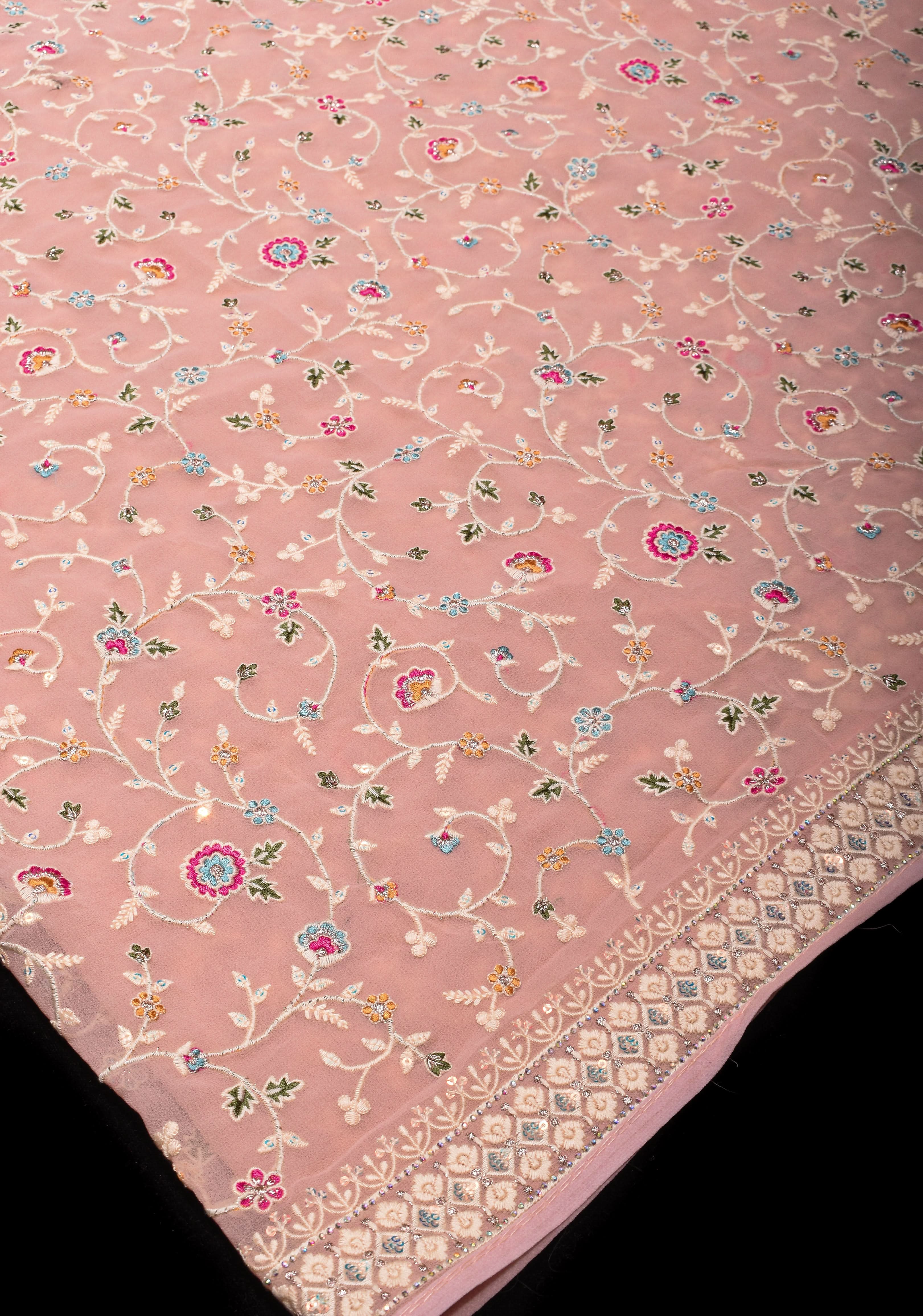 Georgette Saree with Floral Embroidery in Dusty Peach with Dainty Stones Embellishments | Shobitam