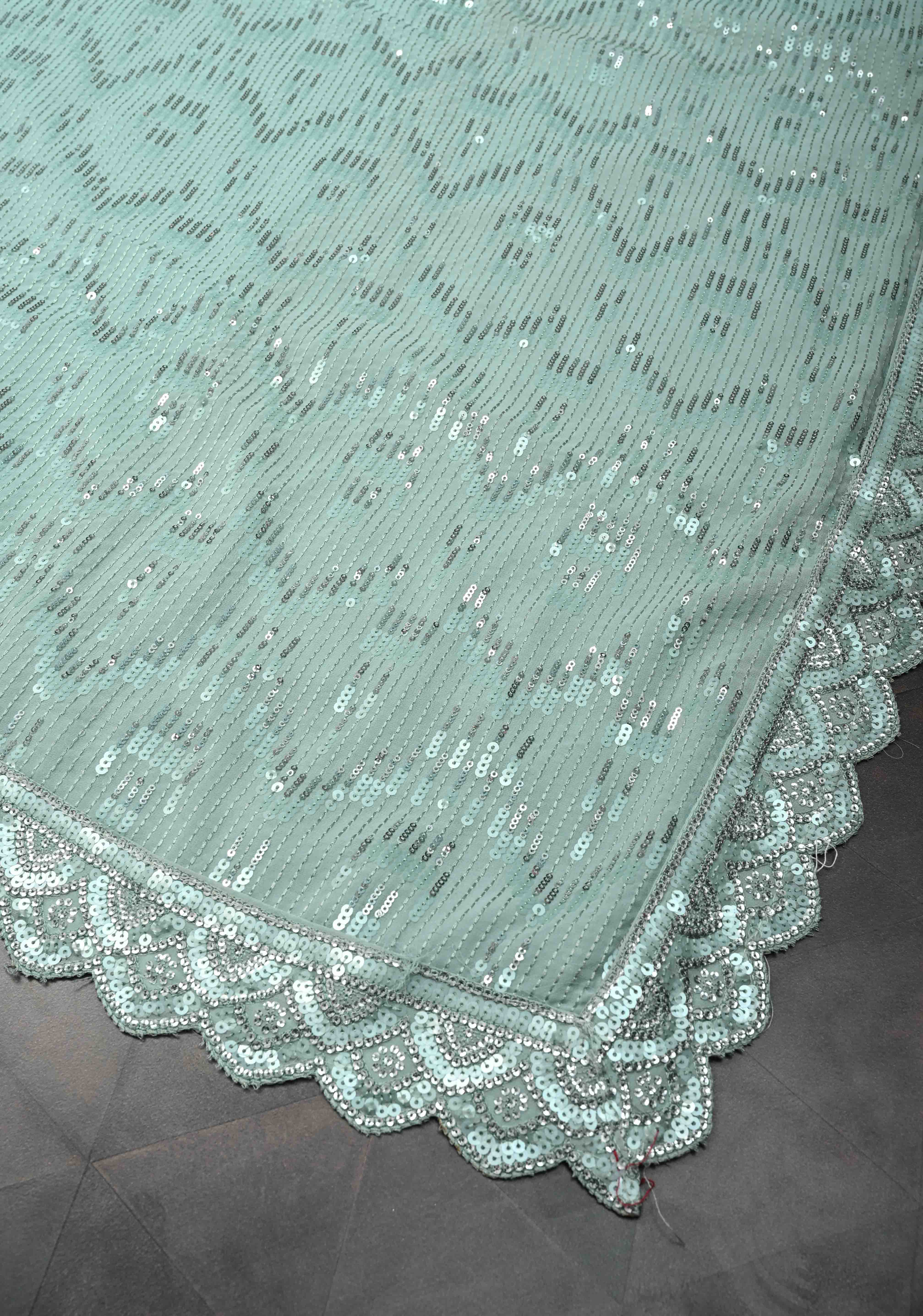 Pale Teal Full Sequins Embellished on Georgette Saree with Scalloped Border | Shobitam