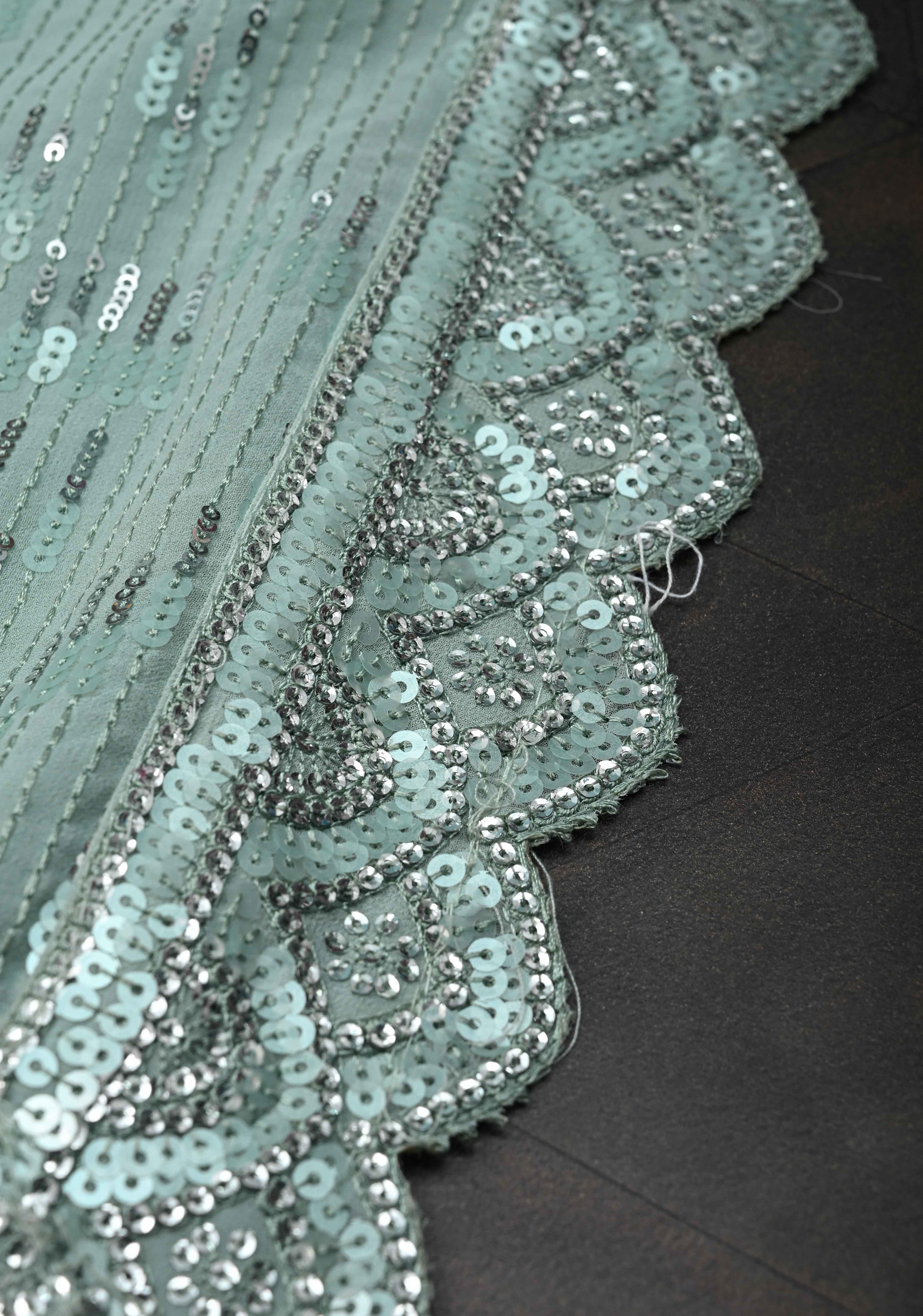 Pale Teal Full Sequins Embellished on Georgette Saree with Scalloped Border | Shobitam