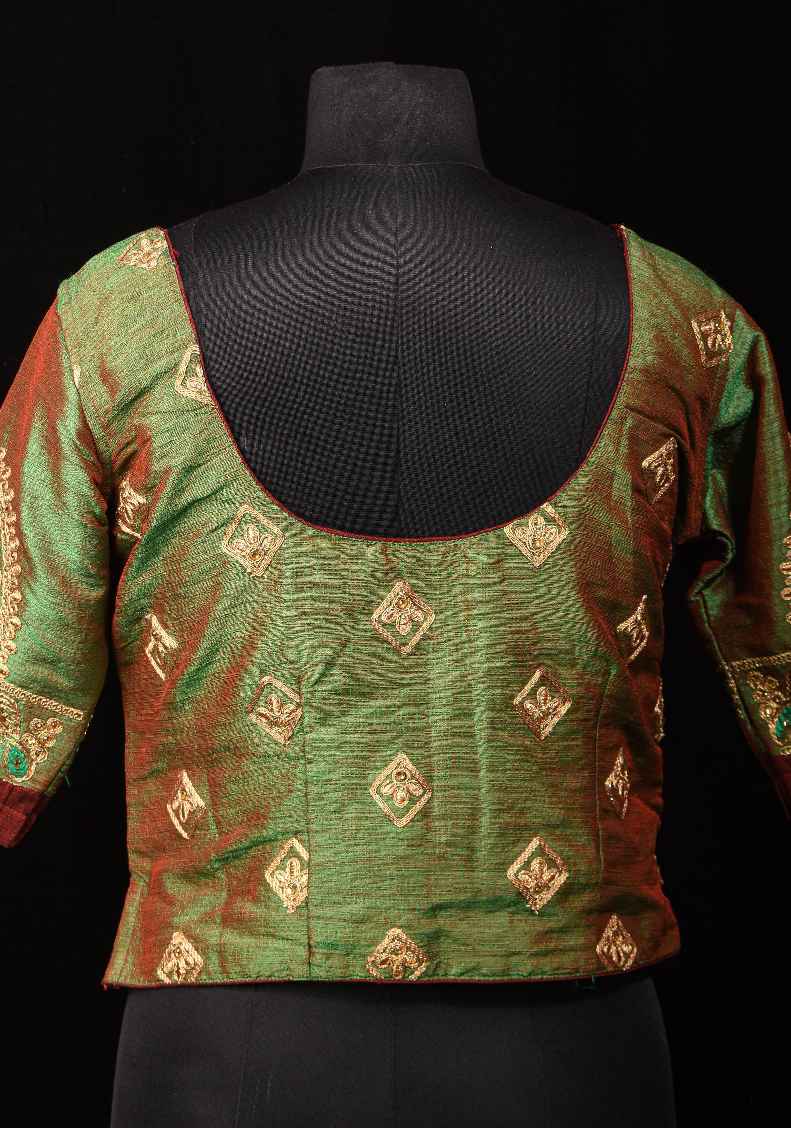 Readymade: Henna Green Semi Raw Silk Medium Length Jacket Blouse with Machine embroidery | Shobitam