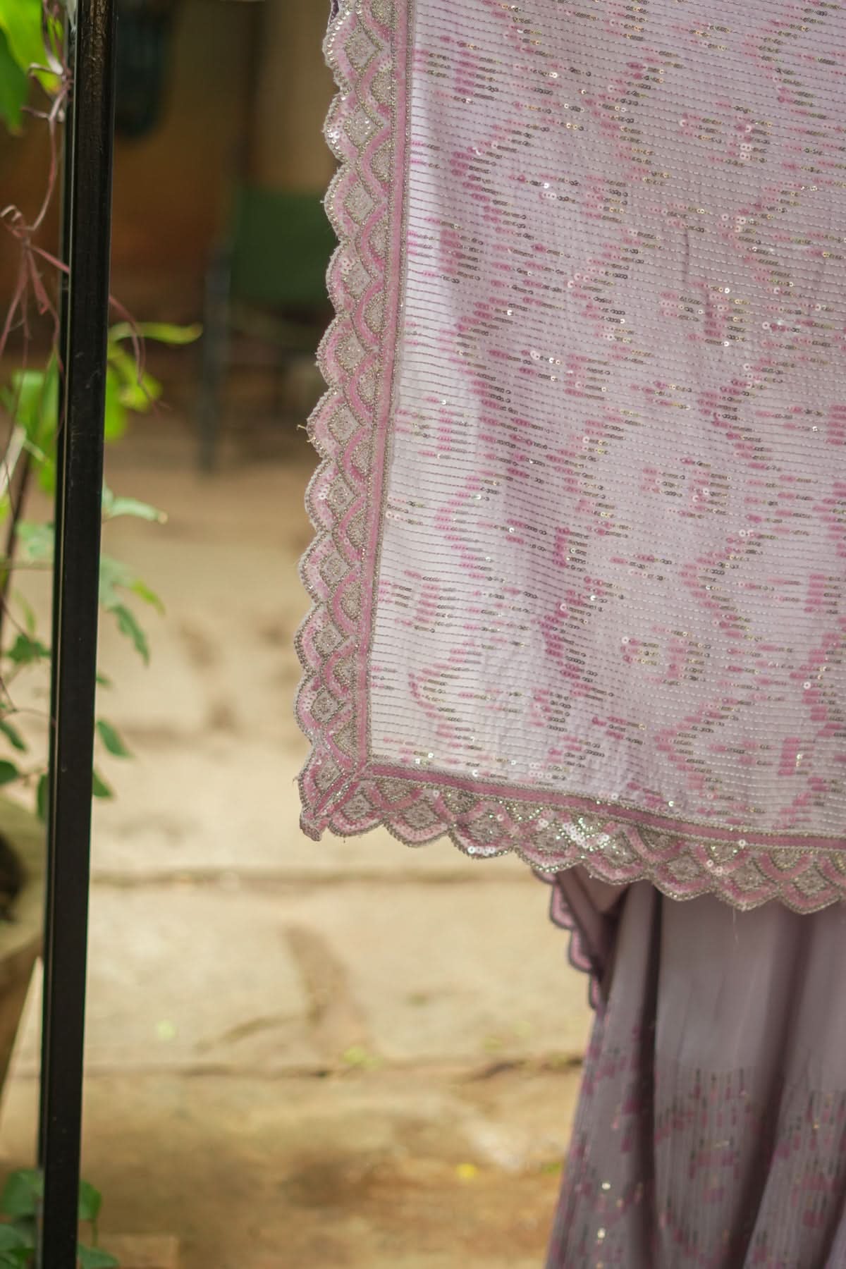 Full Sequins Embellished Georgette Saree in mauve with Scalloped border | Shobitam