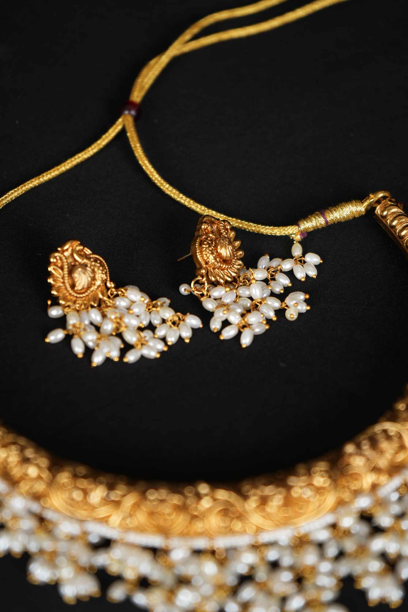 Regal Heritage Gold Necklace Set with Pearl Embellishments & Matching Earrings