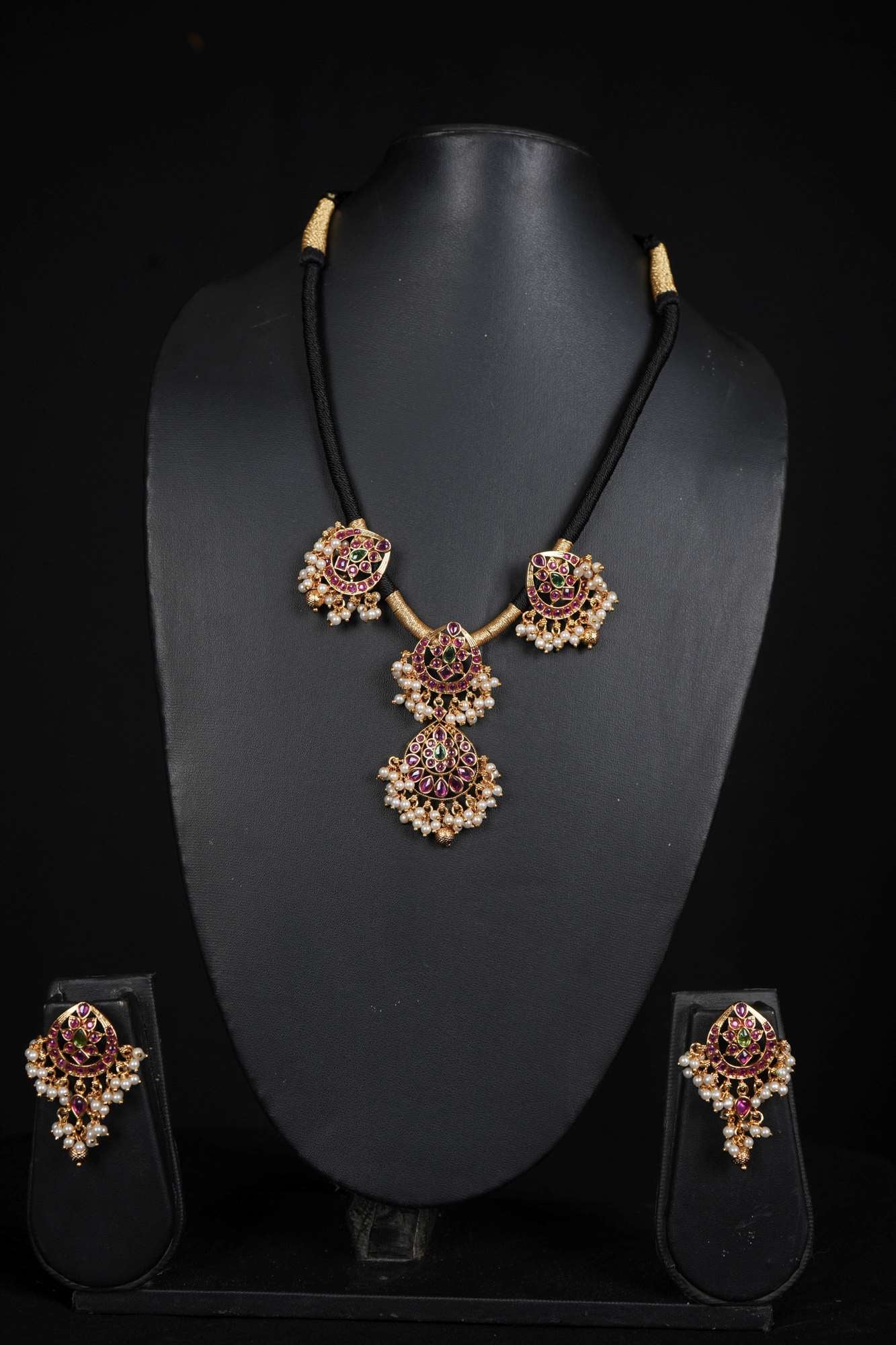 Majestic Kundan Pendant Necklace Set with Ruby and Pearl & Matching Earring