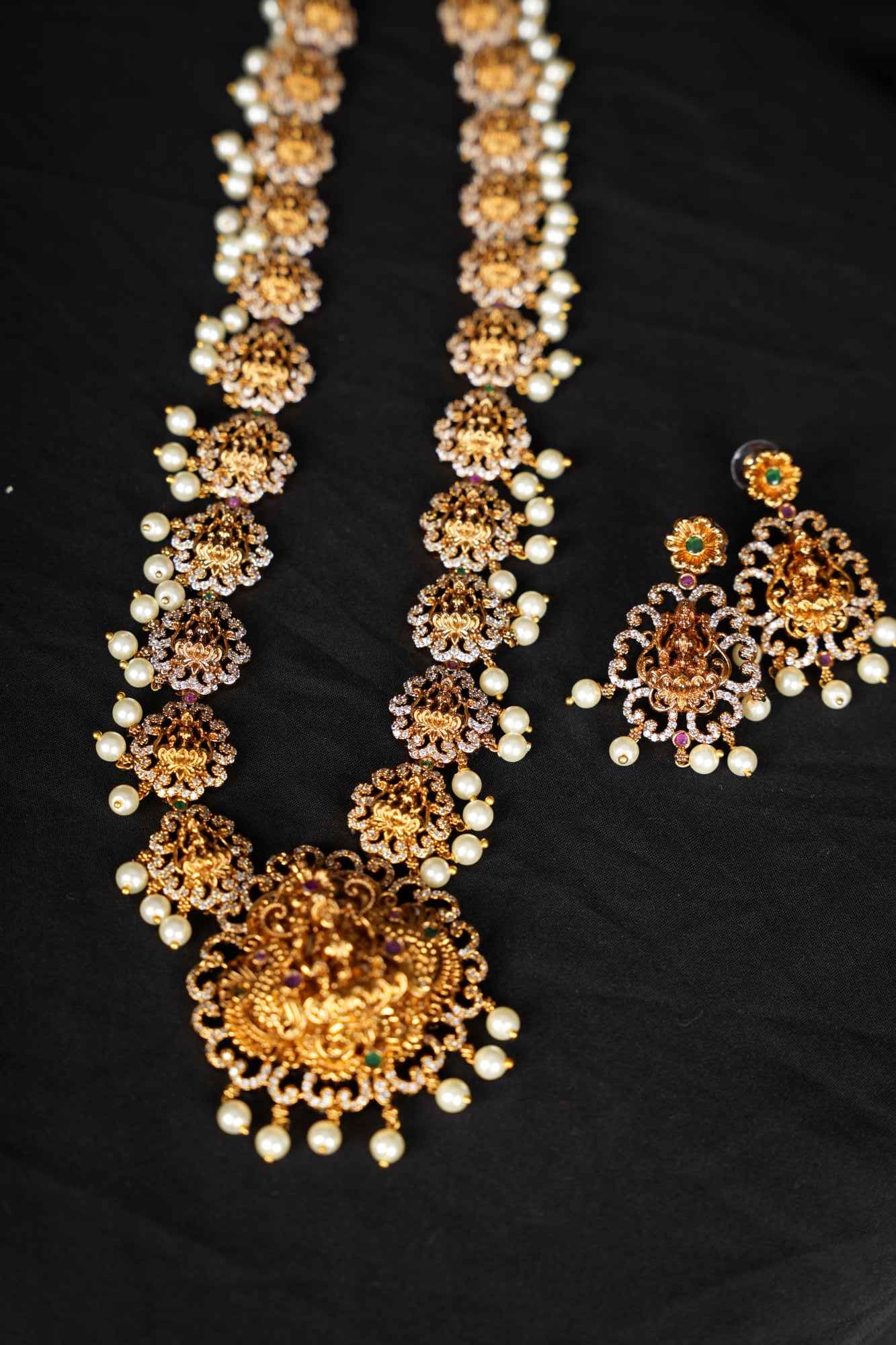 Regal Goddess Temple Jewelry Set with Intricate Gold Detailing and Pearl Accents