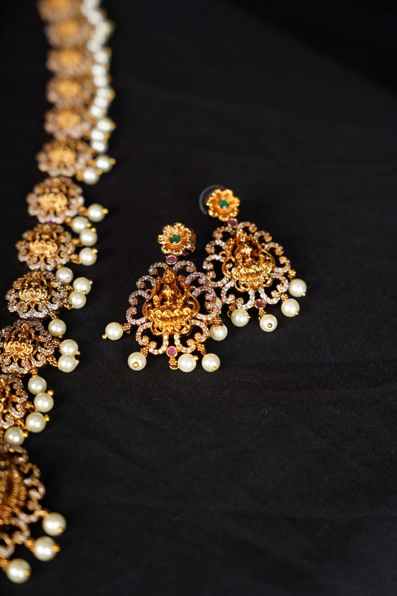 Regal Goddess Temple Jewelry Set with Intricate Gold Detailing and Pearl Accents