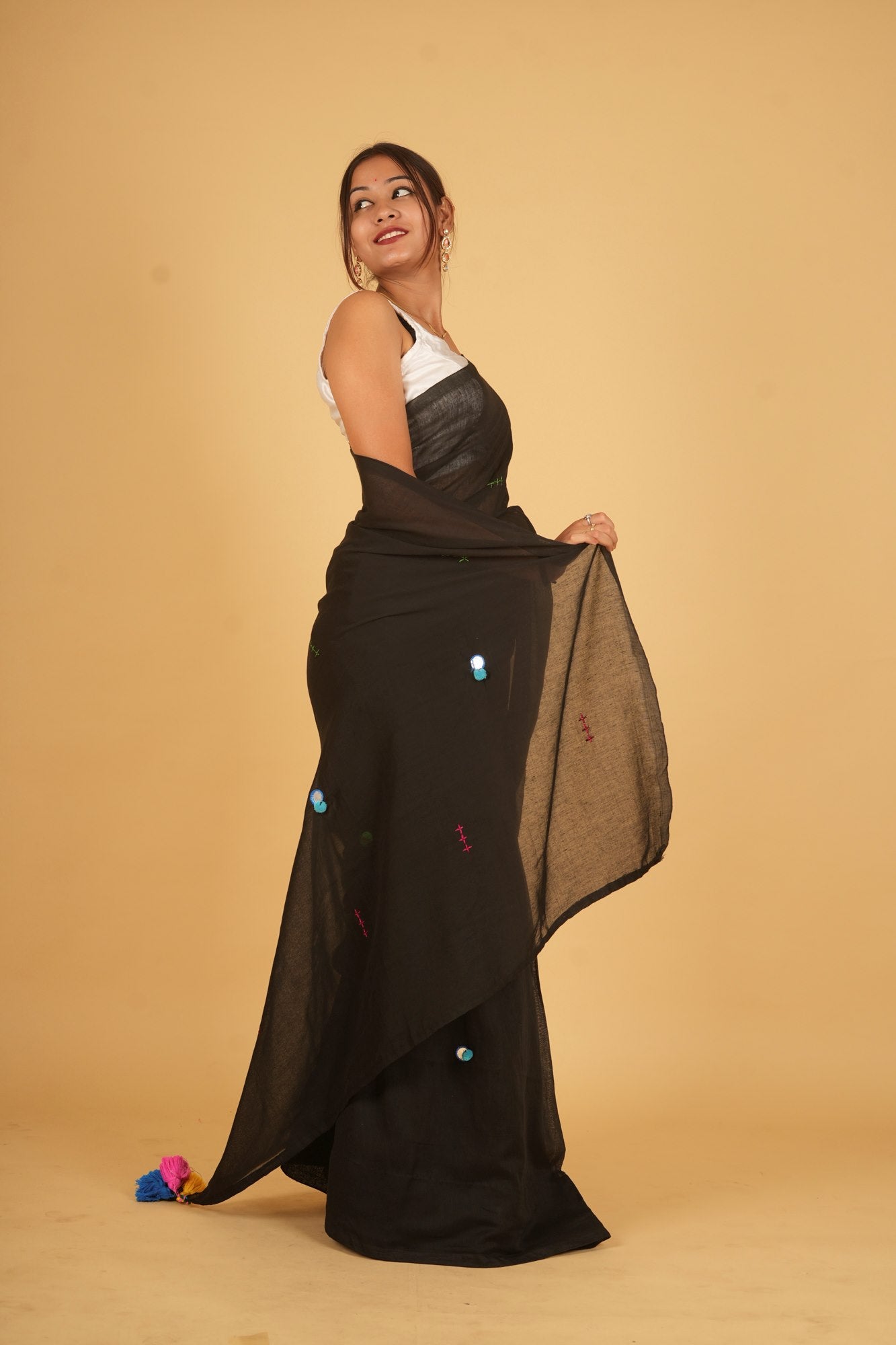 Ready to wear Beautiful Black saree in Mulmul with mirror work motifs inspired by the Rabari embroidery