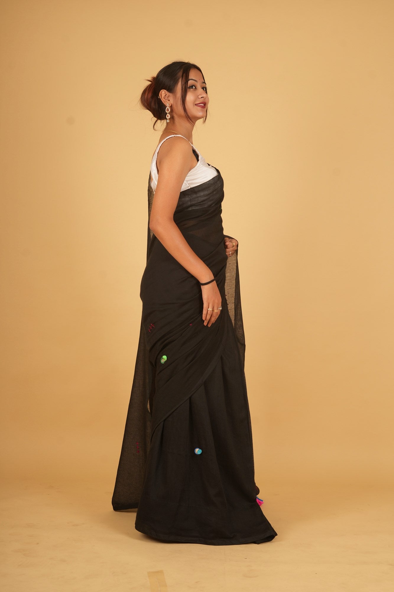 Ready to wear Beautiful Black saree in Mulmul with mirror work motifs inspired by the Rabari embroidery