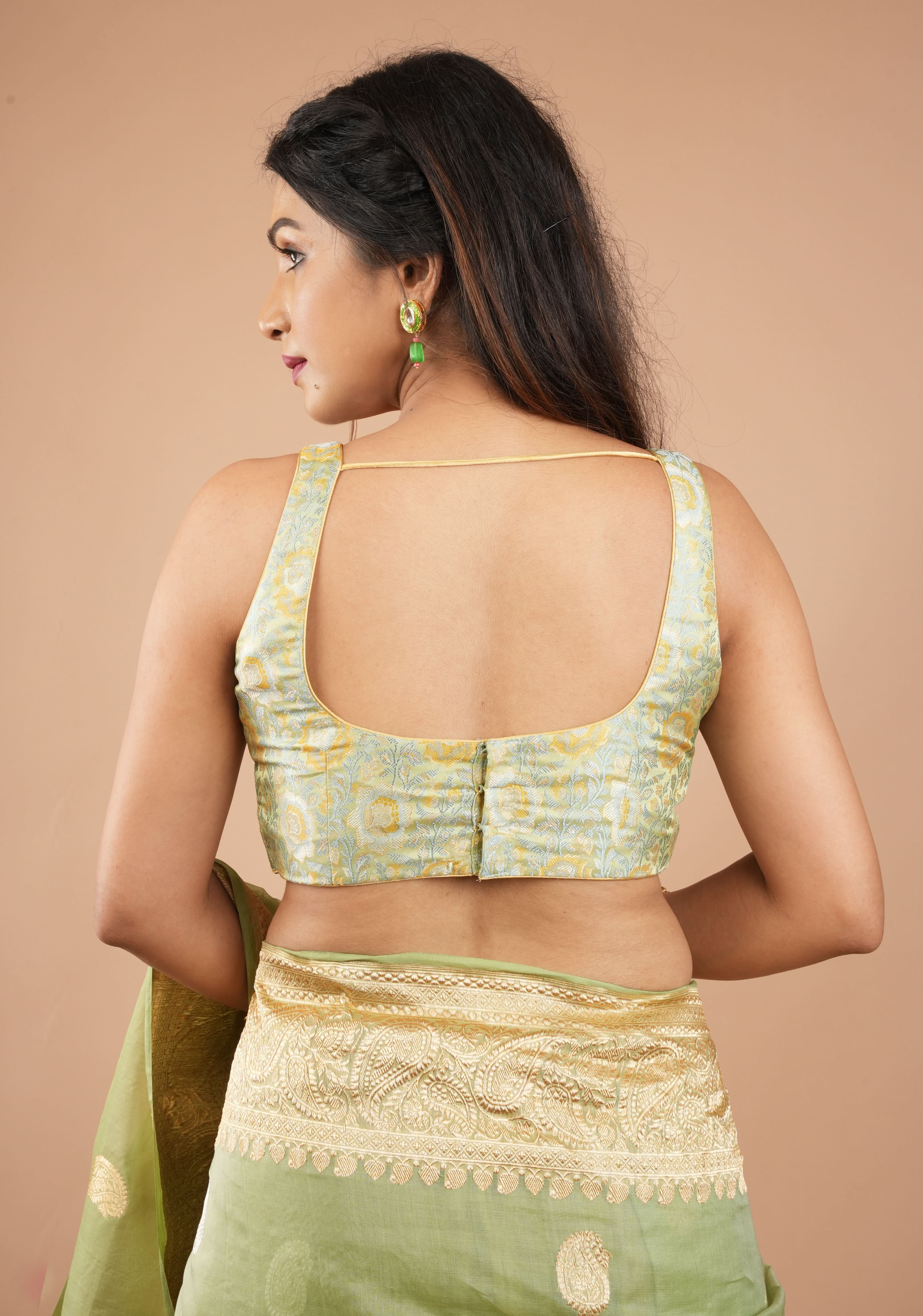 Pista Green Tanchoi Floral sleeveless blouse with beaded trim detailing, Customizable, Made to order | Shobitam