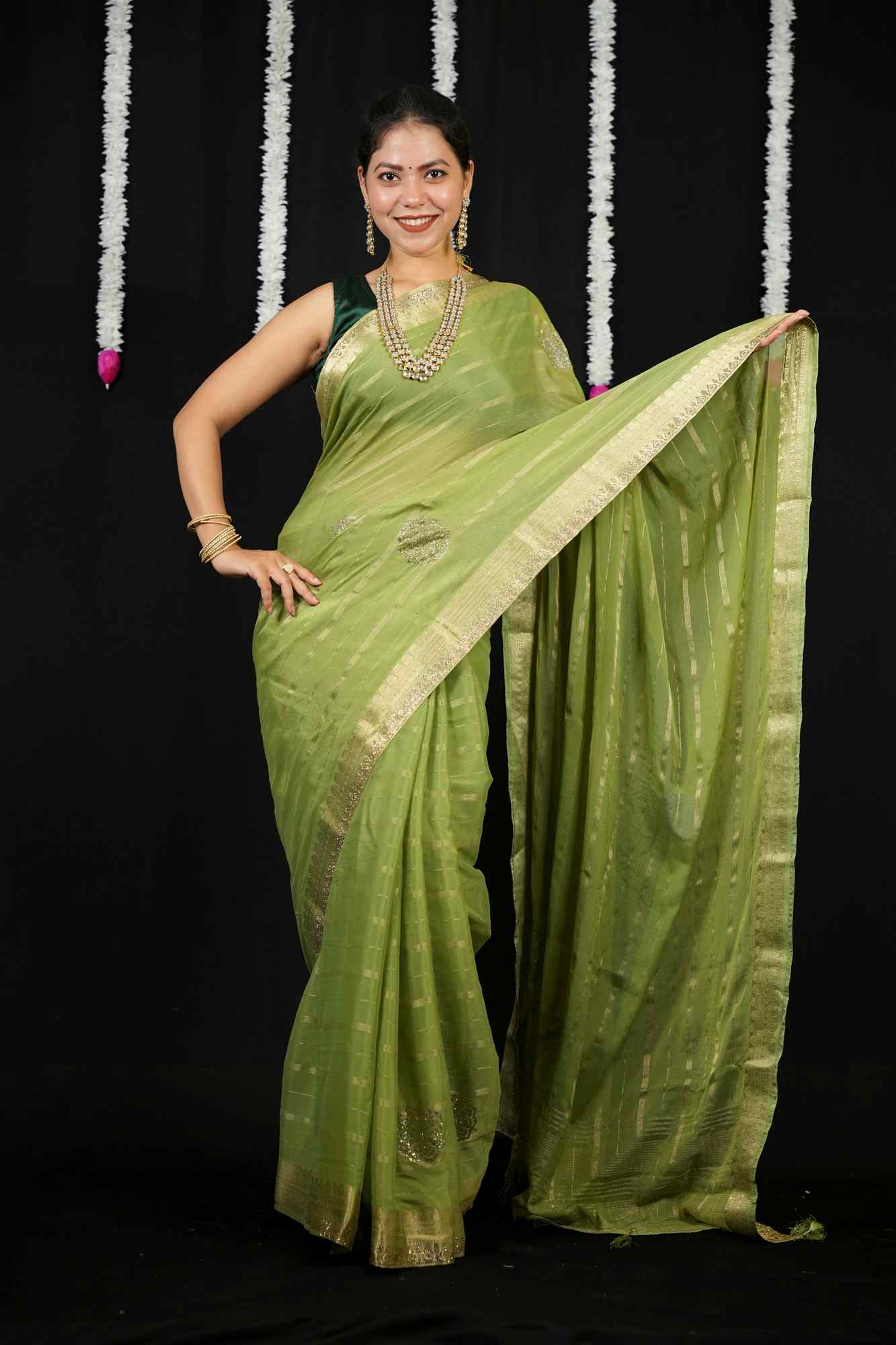 Chiffon with Zari Stripes, Floral Motifs & Stone Embellishments Ready To wear Saree