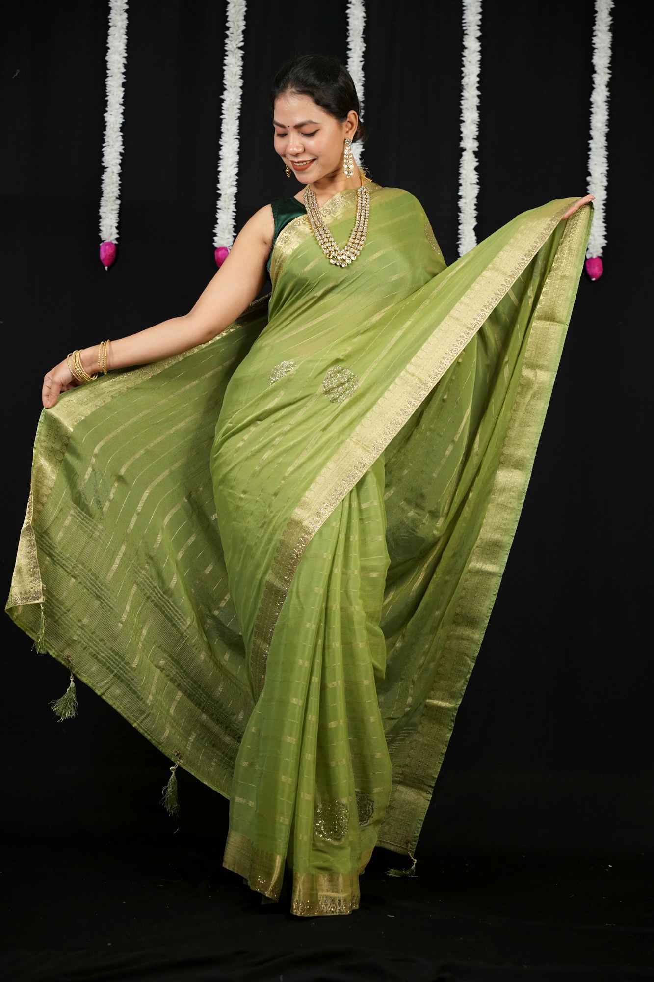 Chiffon with Zari Stripes, Floral Motifs & Stone Embellishments Ready To wear Saree