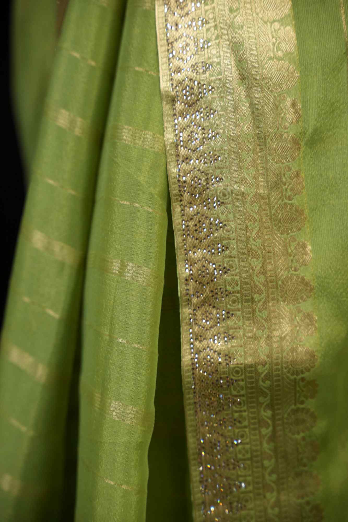 Chiffon with Zari Stripes, Floral Motifs & Stone Embellishments Ready To wear Saree
