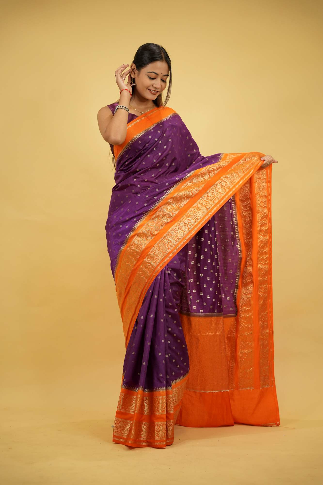 South silk with butis and woven zari contrast border prestitched saree