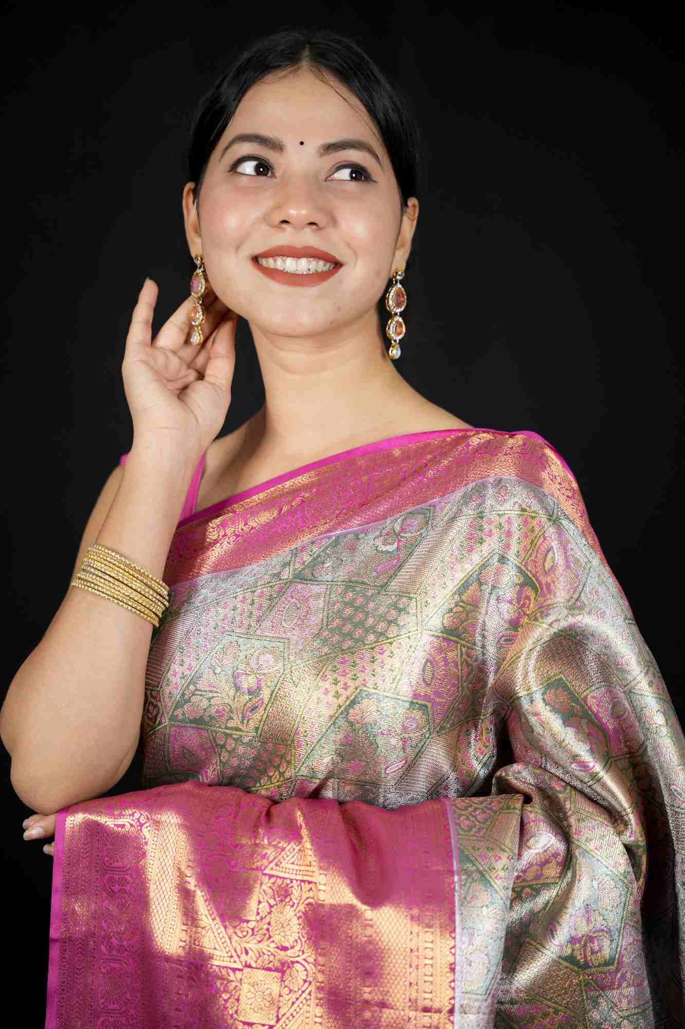 Kanchi Pattu with Intricate Floral Weave & Grand Zari Border Ready To Wear Saree