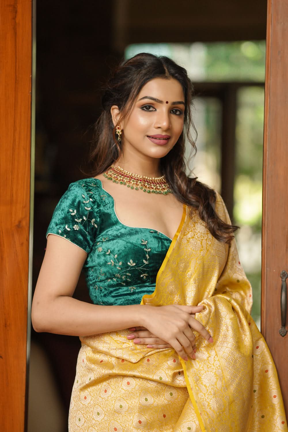 Rama green velvet with Antique Gold sequins Arch Neck blouse, Made to Order | SHOBITAM