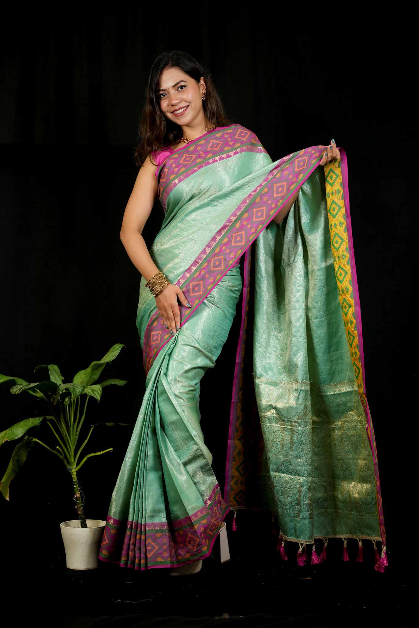 Sea Green Patola inspired Silk with Contrast Pink Ikat-Inspired Border Ready To Wear Saree