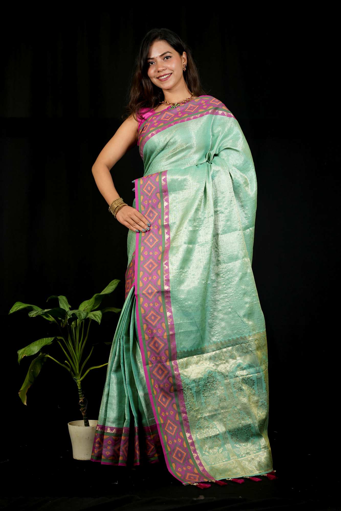 Sea Green Patola inspired Silk with Contrast Pink Ikat-Inspired Border Ready To Wear Saree