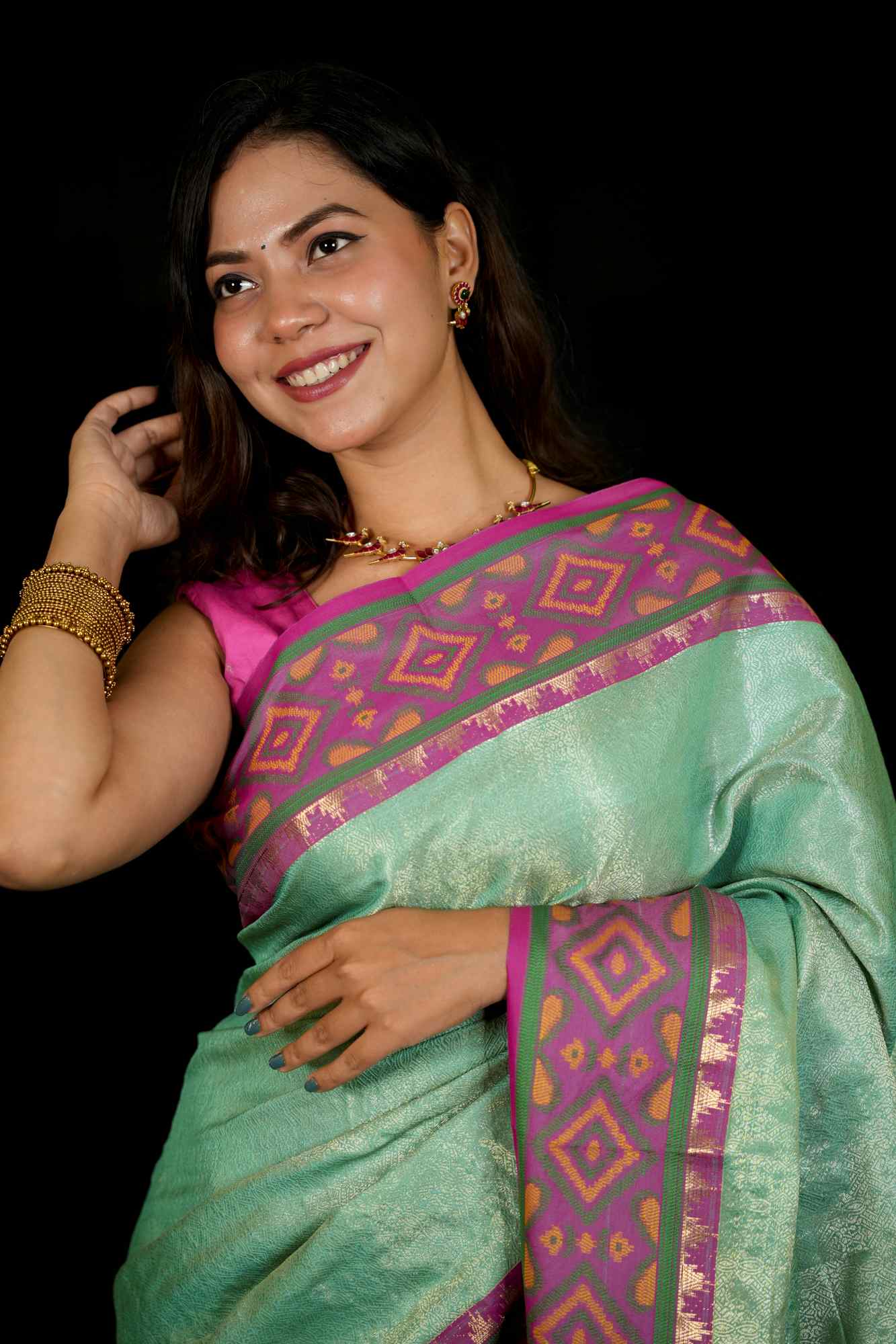 Sea Green Patola inspired Silk with Contrast Pink Ikat-Inspired Border Ready To Wear Saree