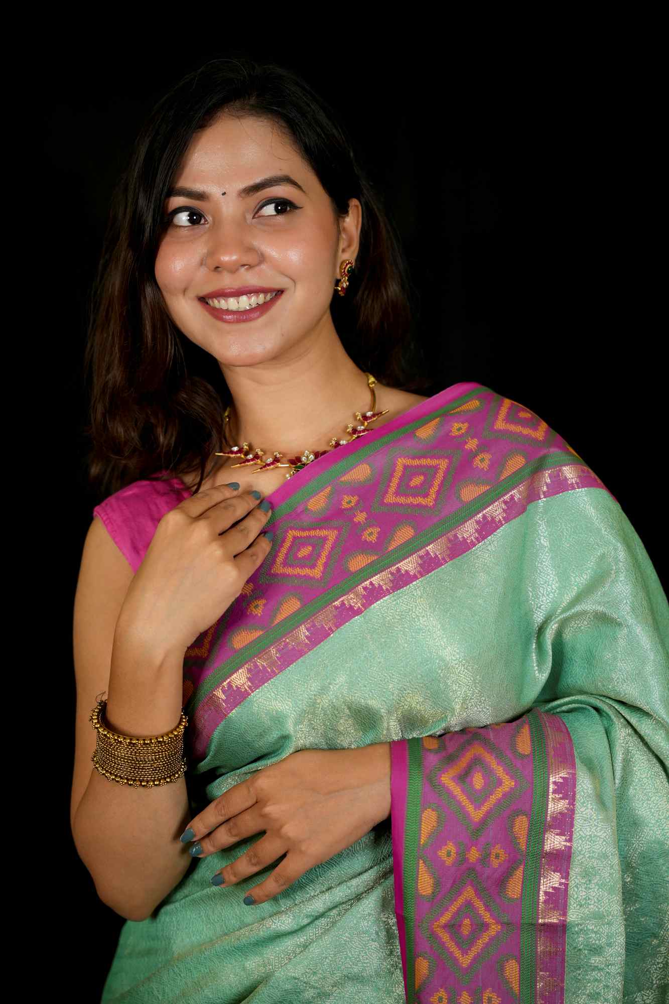 Sea Green Patola inspired Silk with Contrast Pink Ikat-Inspired Border Ready To Wear Saree