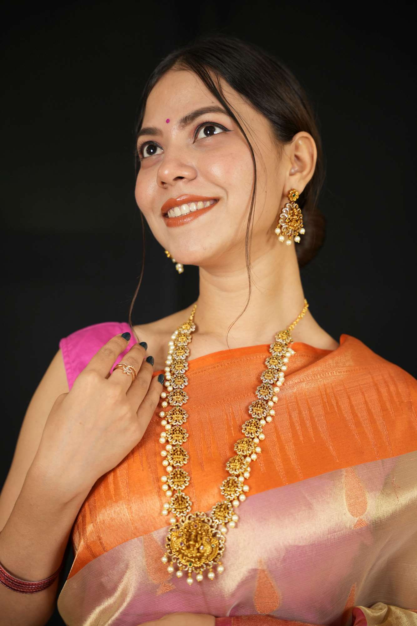 Regal Goddess Temple Jewelry Set with Intricate Gold Detailing and Pearl Accents