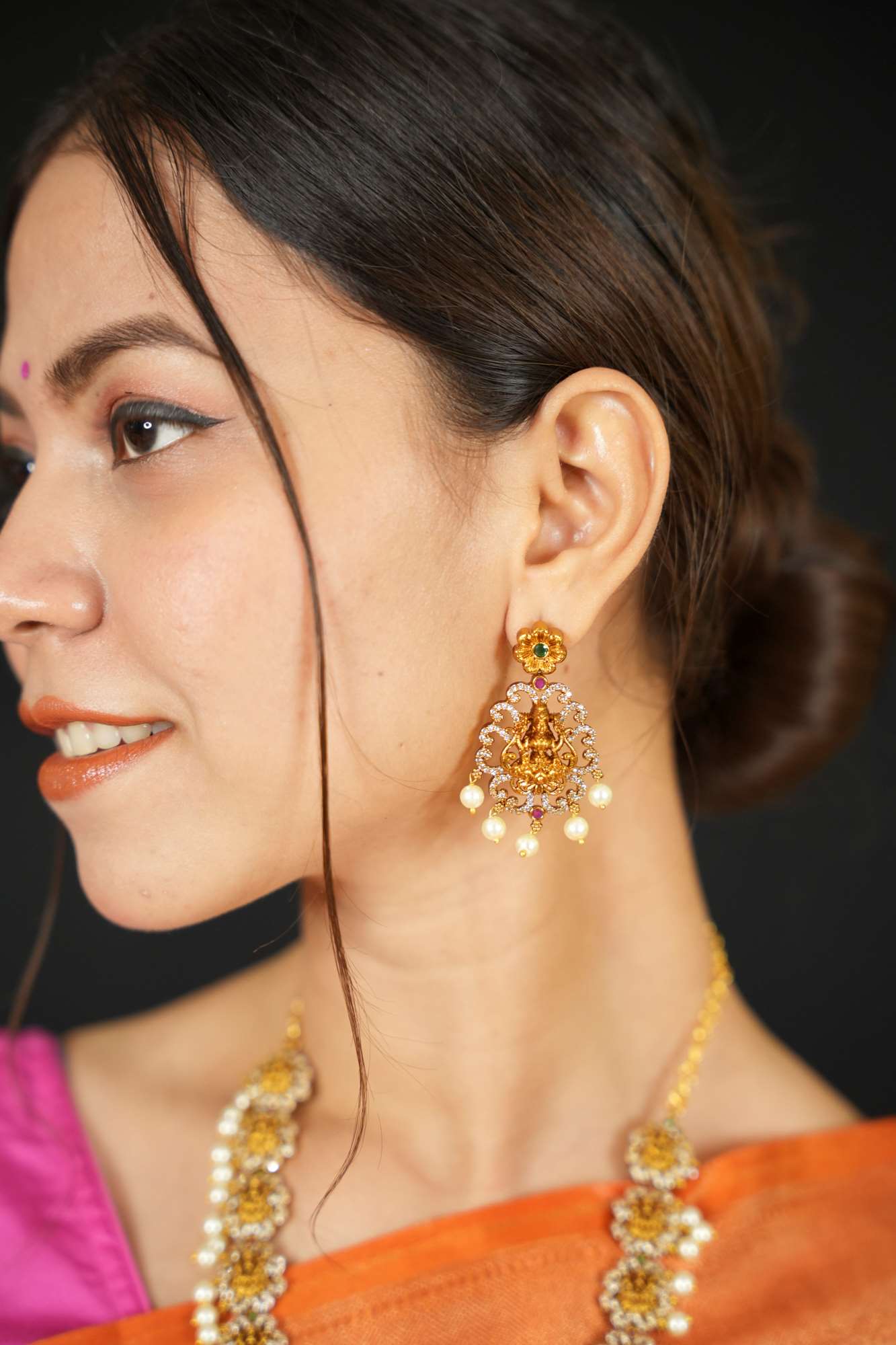 Regal Goddess Temple Jewelry Set with Intricate Gold Detailing and Pearl Accents