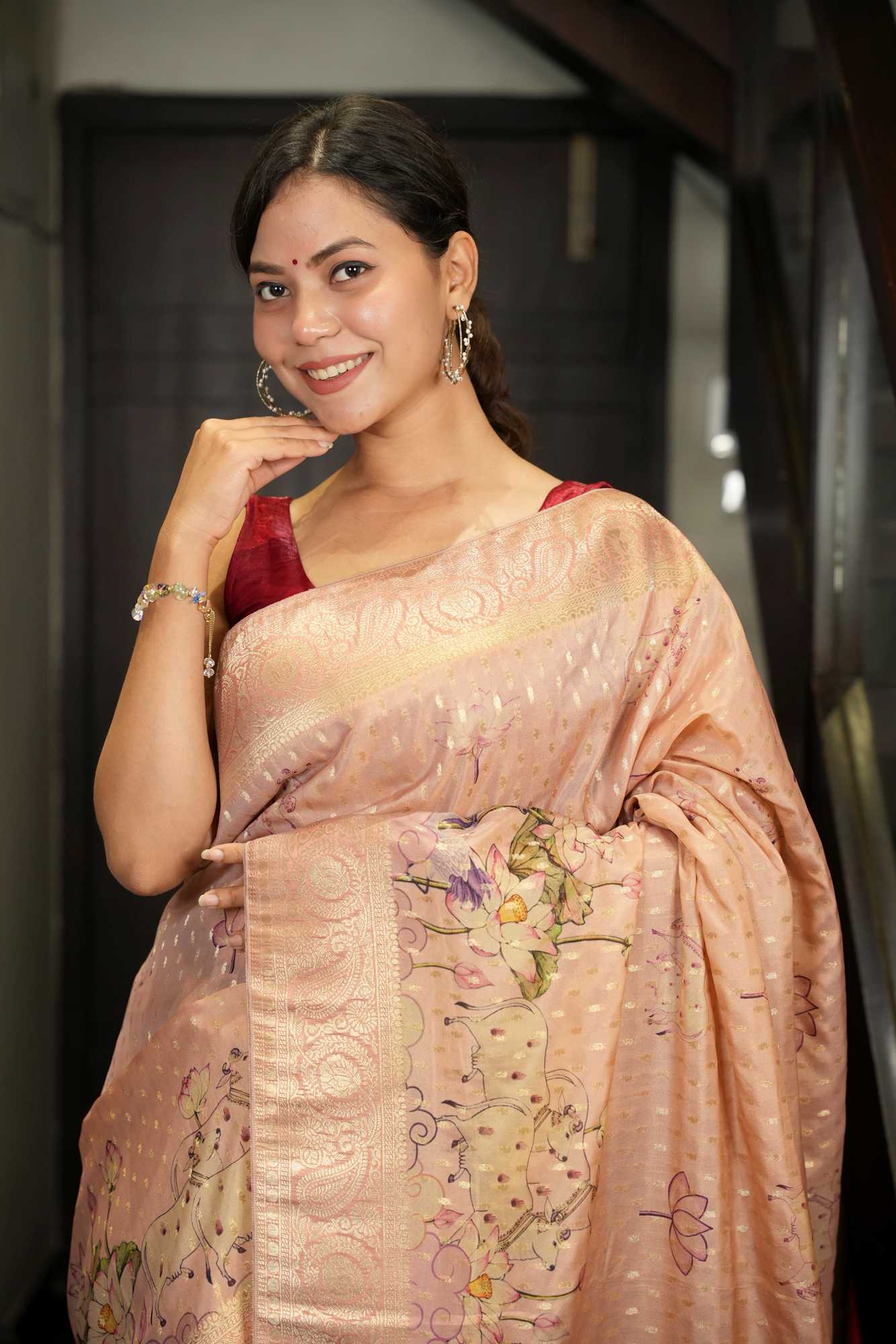 Peach Viscose Georgette Silk with Woven Detailing, Digital Prints & Tassels Ready To Wear Saree